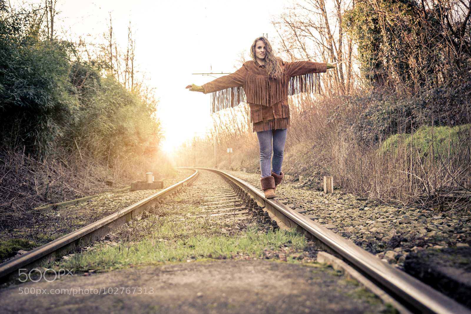 Nikon D610 sample photo. Woman walking on rail photography