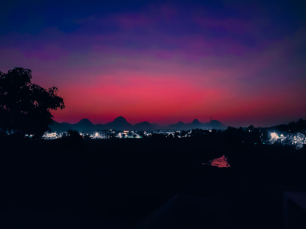 Wallpaper photograph of Reddish Evening sky in the town / city captured by Jayashankar Majhi on 500px.com