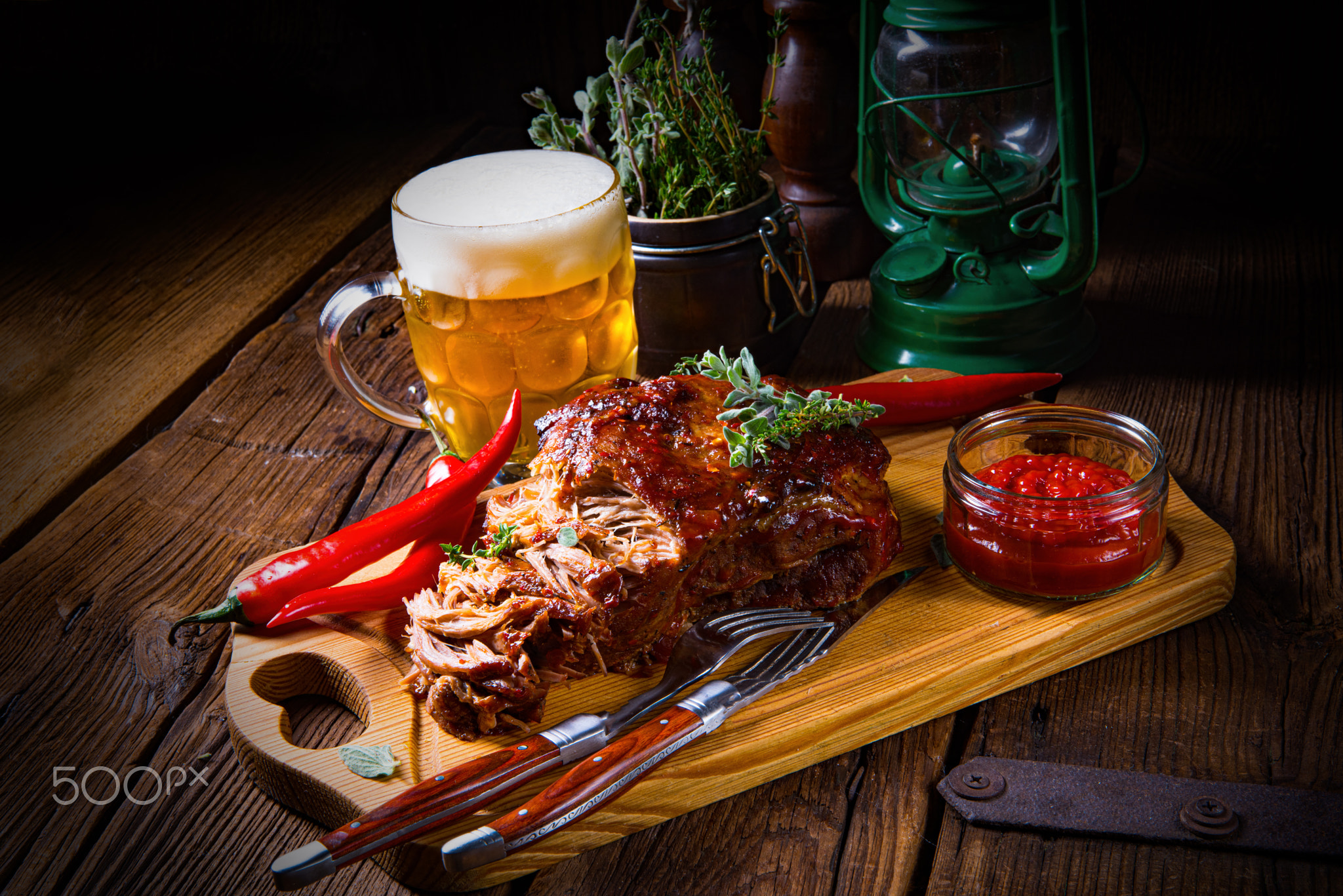 Pulled pork out of the oven with beer sauce