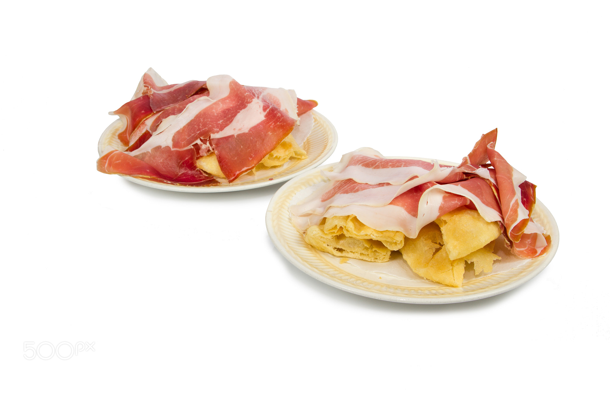 Appetizer with pizza and ham