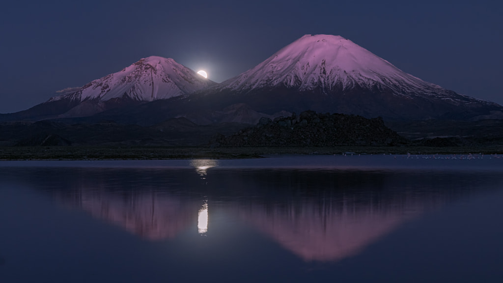 Moonrise between Payachata volcanos by Andres Puiggros on 500px.com