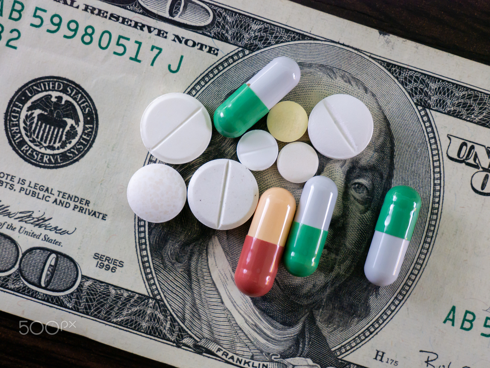 Pills and money. Medicines and dollars.