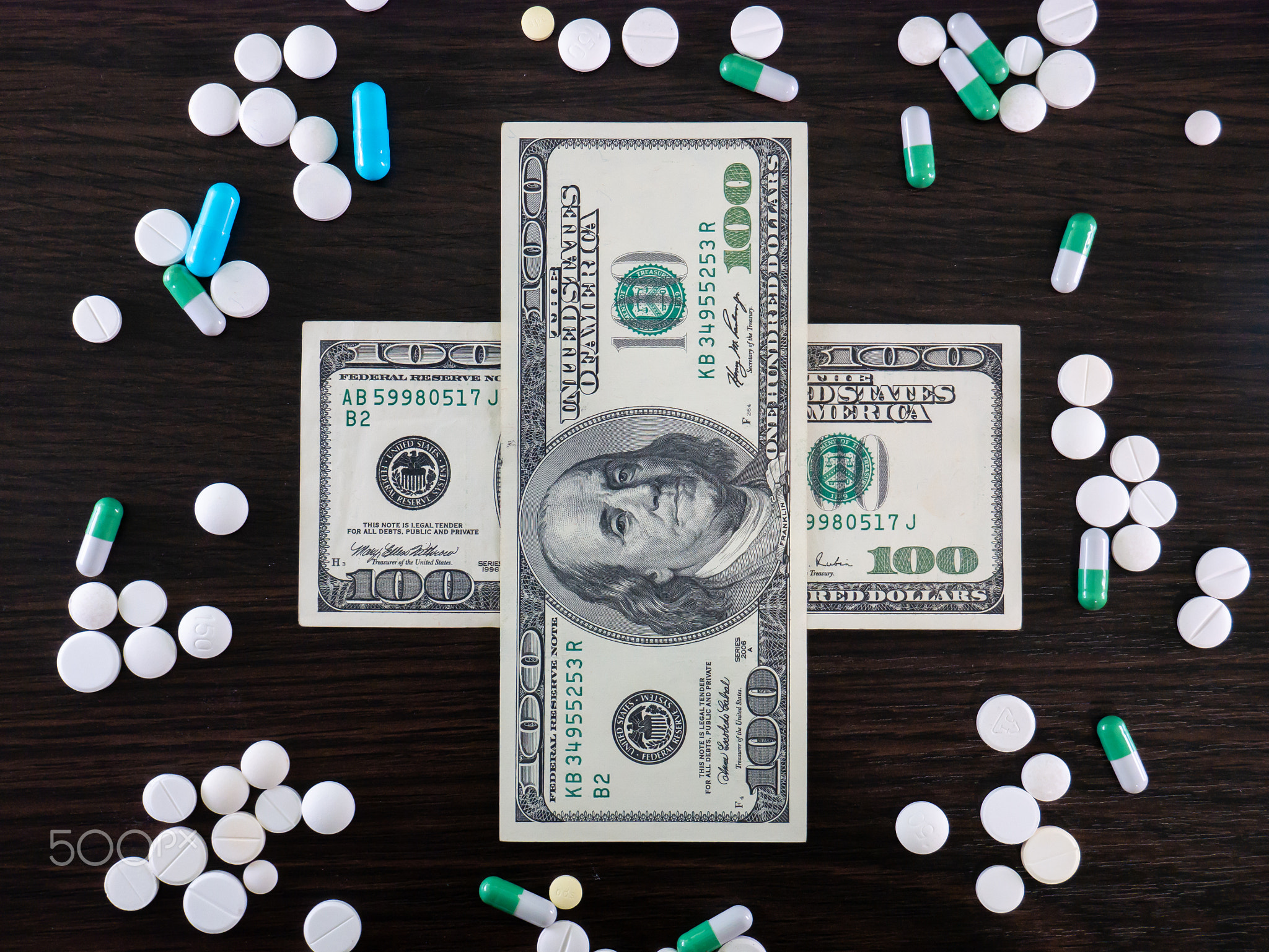 Pills and money. Medicines and dollars.