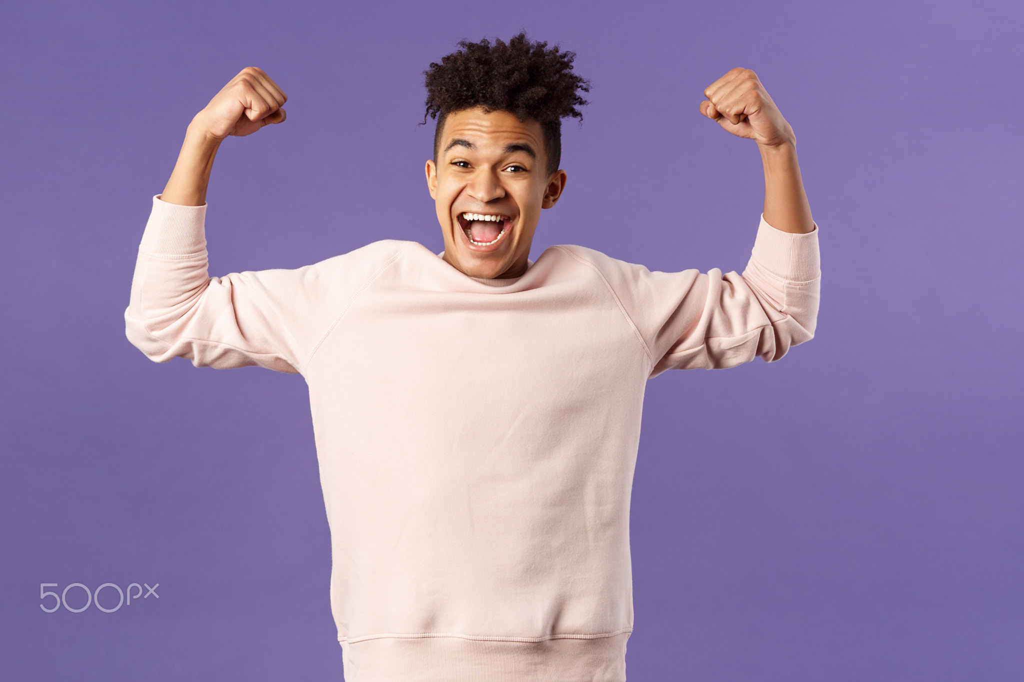 Portrait of young happy man got scholarship, applied to cool