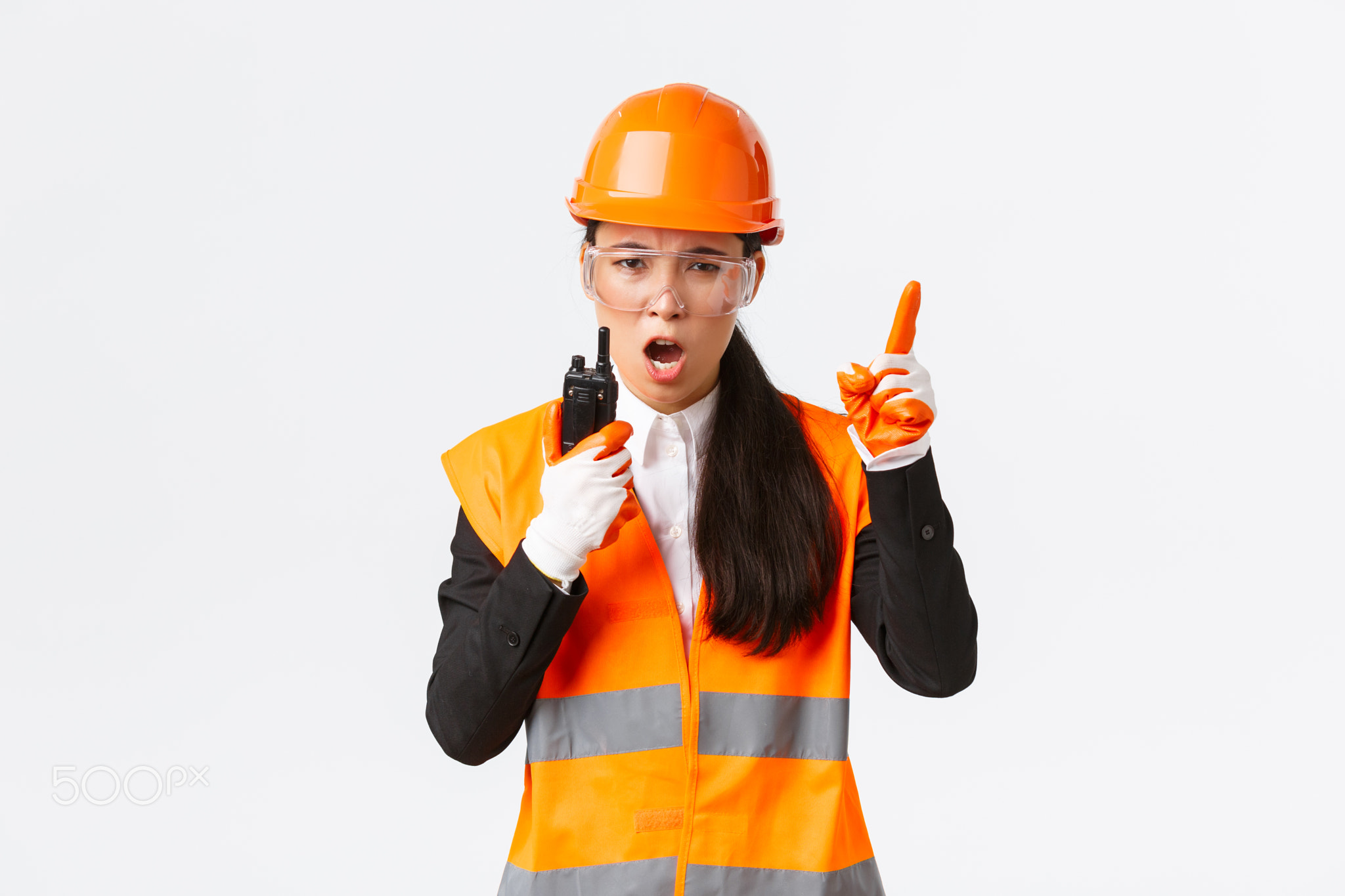 Serious-looking asian female industrial engineer, technician in safety