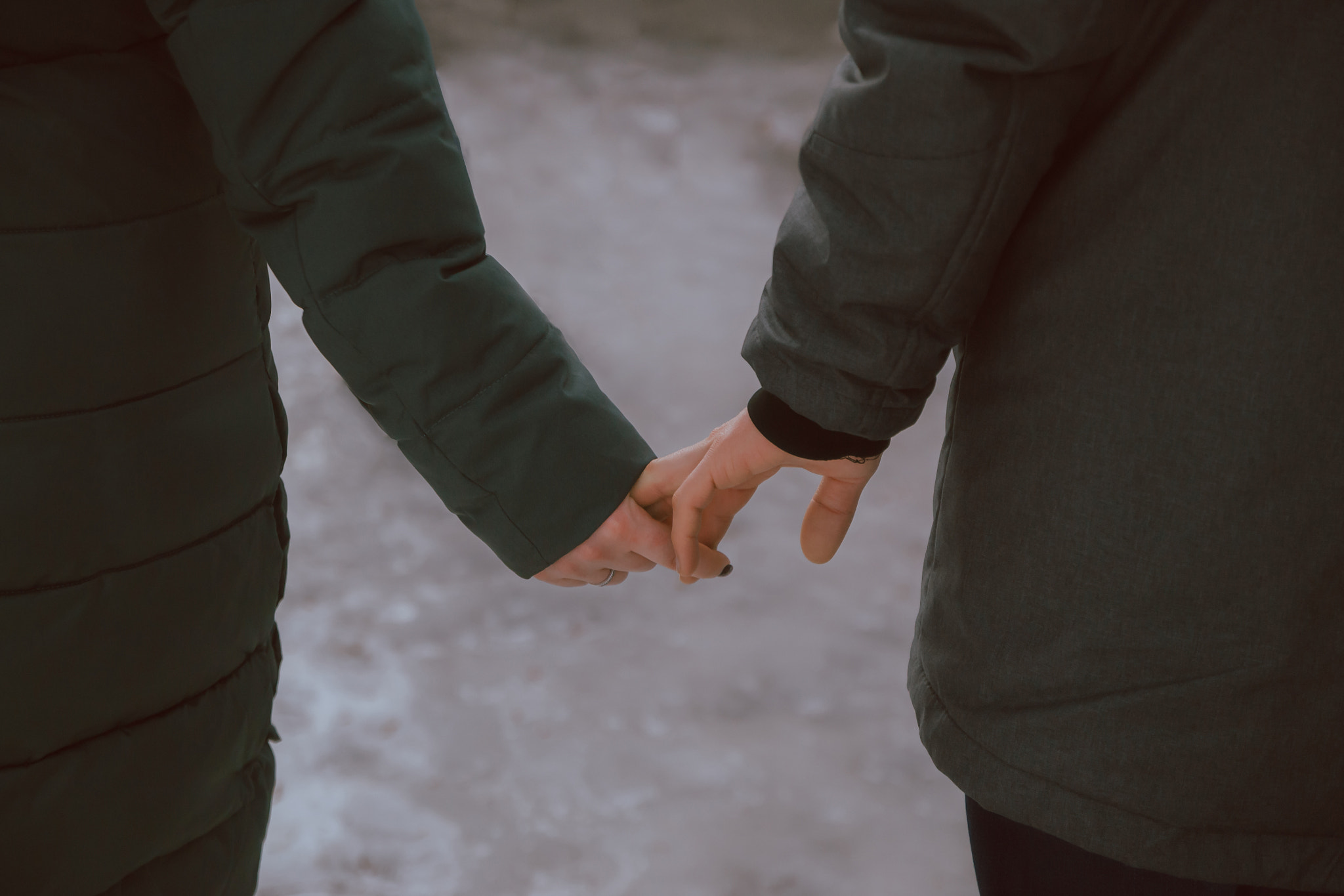 Loving couple holding hands