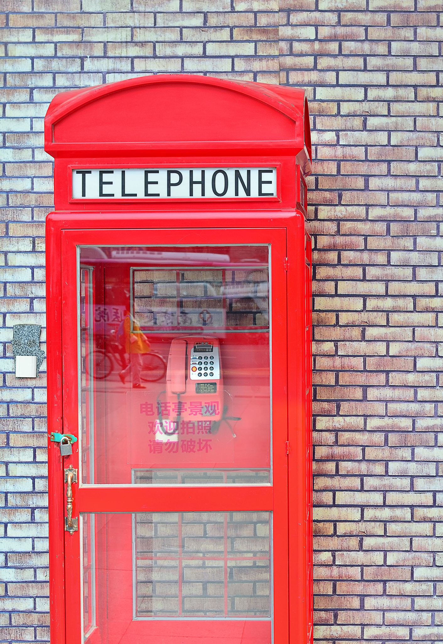 Reflection on a Telephone Booth