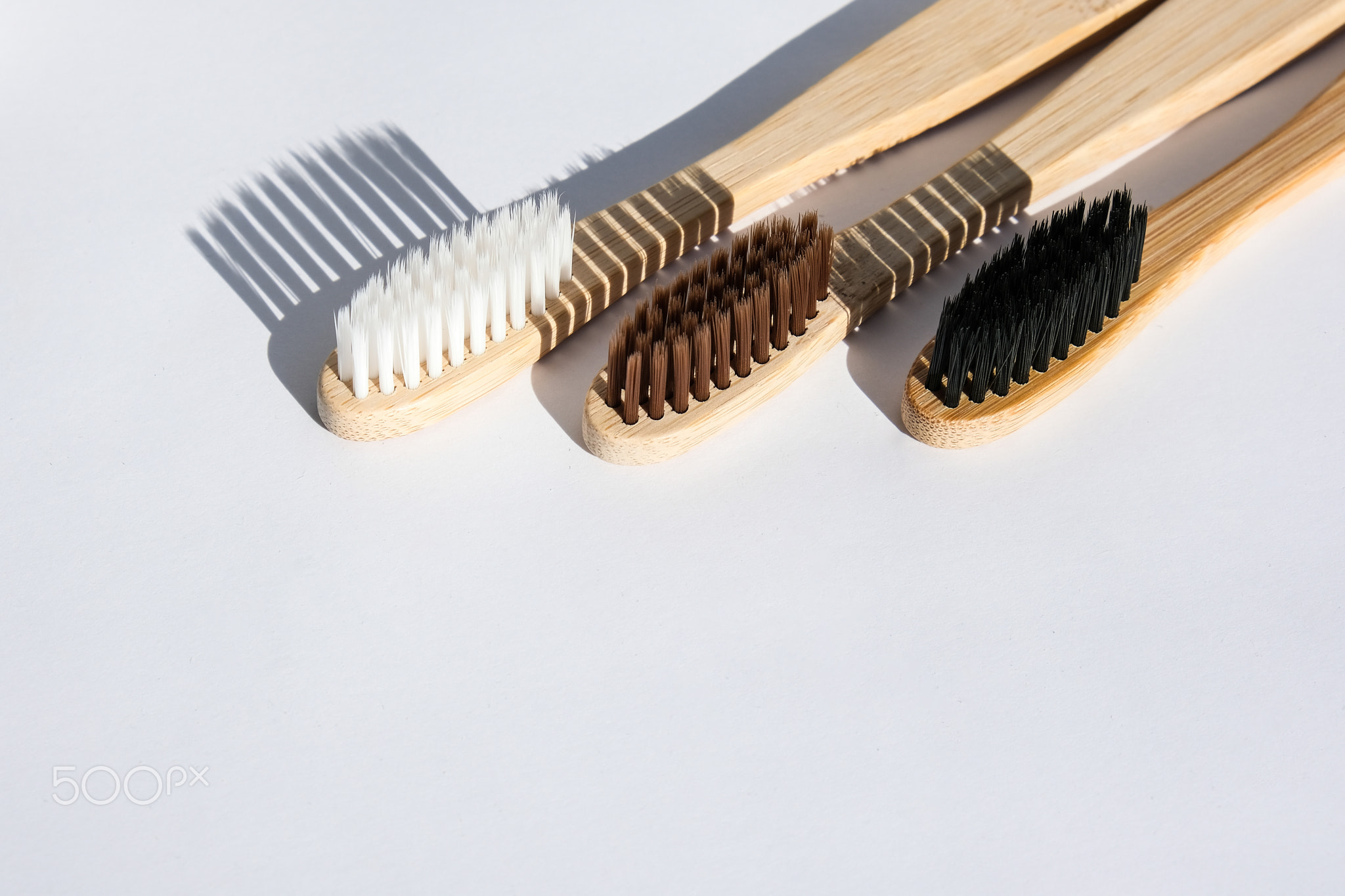 Bamboo toothbrush. Biodegradable, organic on a white background with