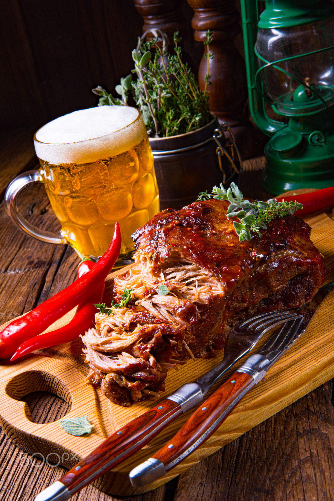 Pulled pork out of the oven with beer sauce