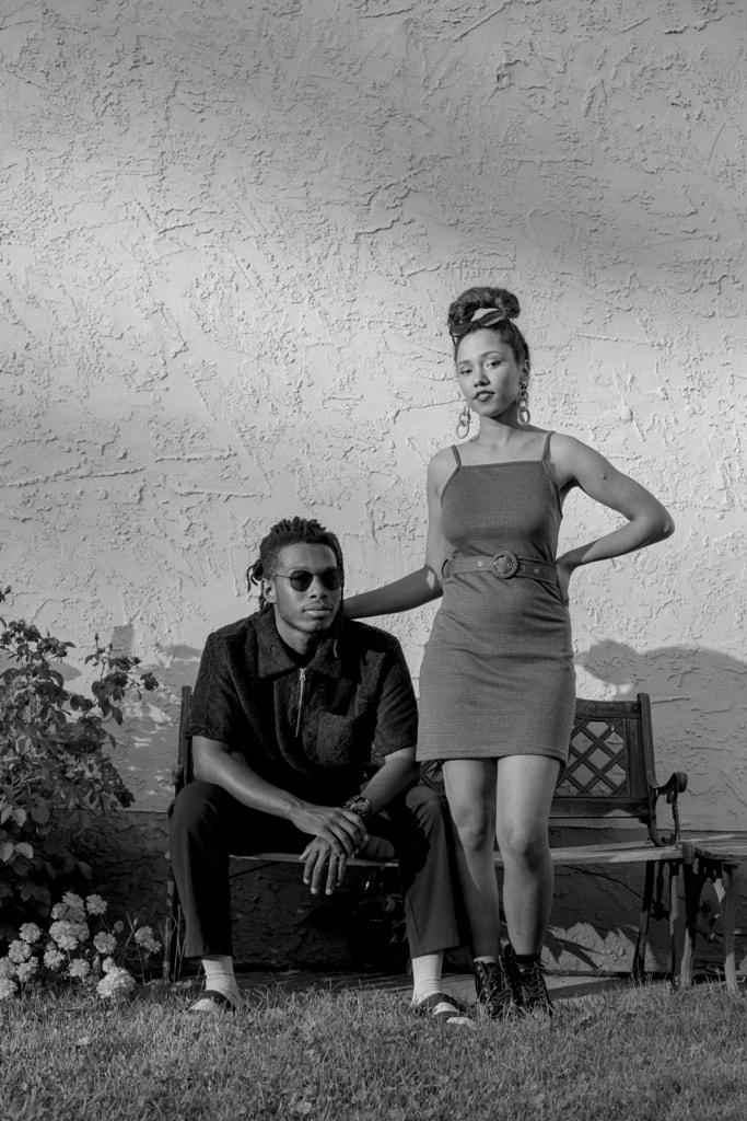 Black and white young couple posed for camera by Hagar Wirba on 500px.com