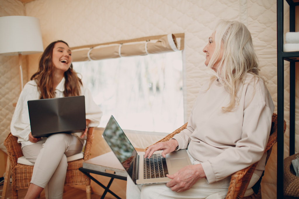 Women with laptop relaxing at glamping camping tent. Modern vacation by Max Chernishev on 500px.com