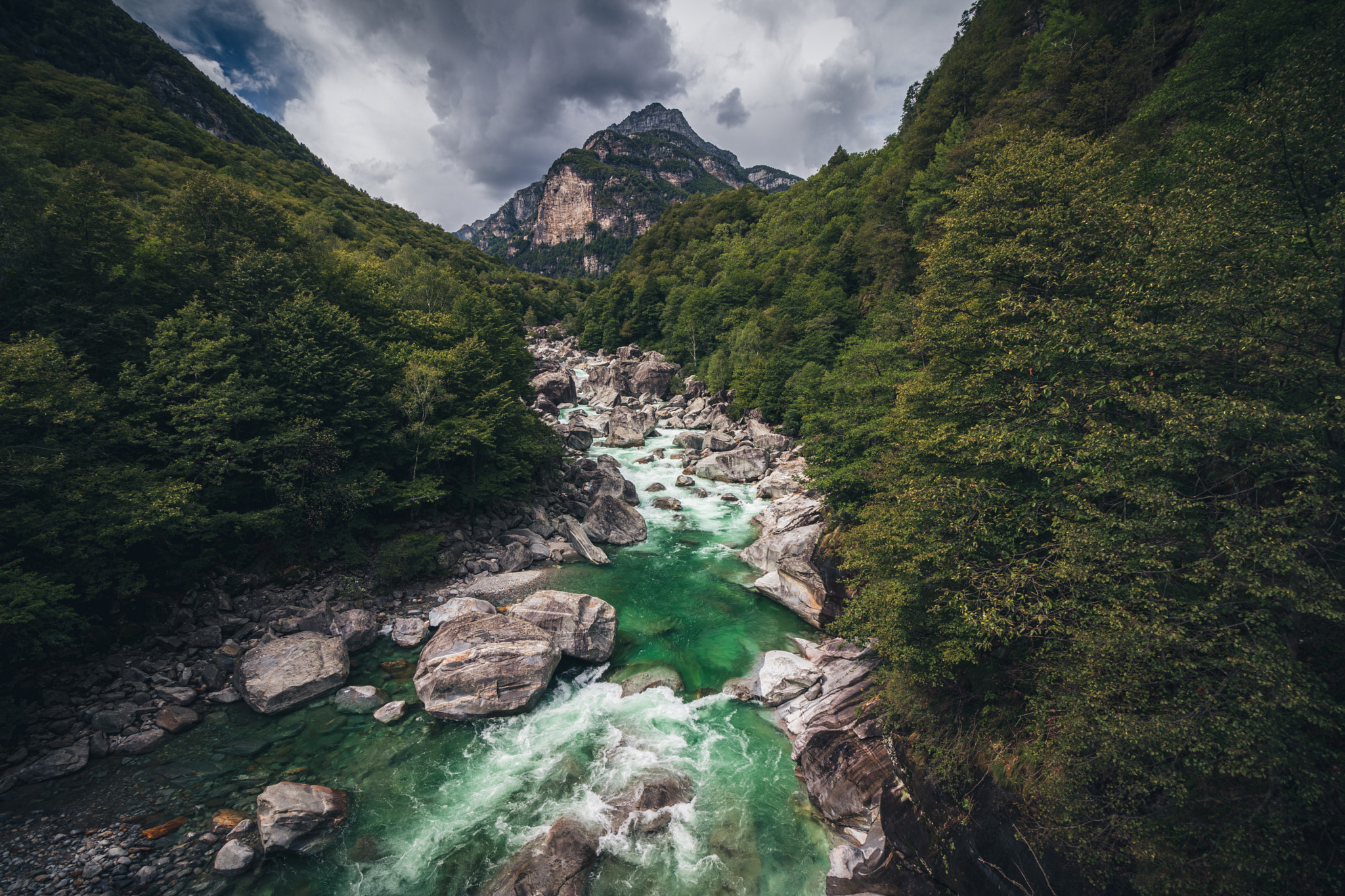 Moody river in the alps