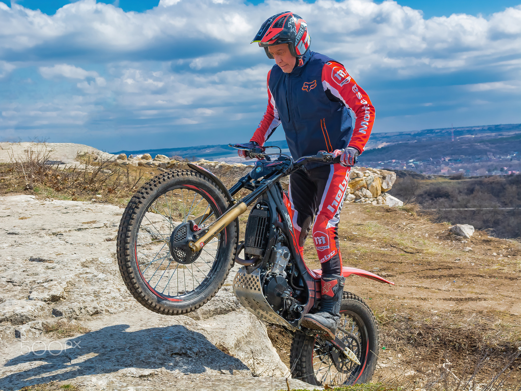 Mototrial in spring in a mountain landscape