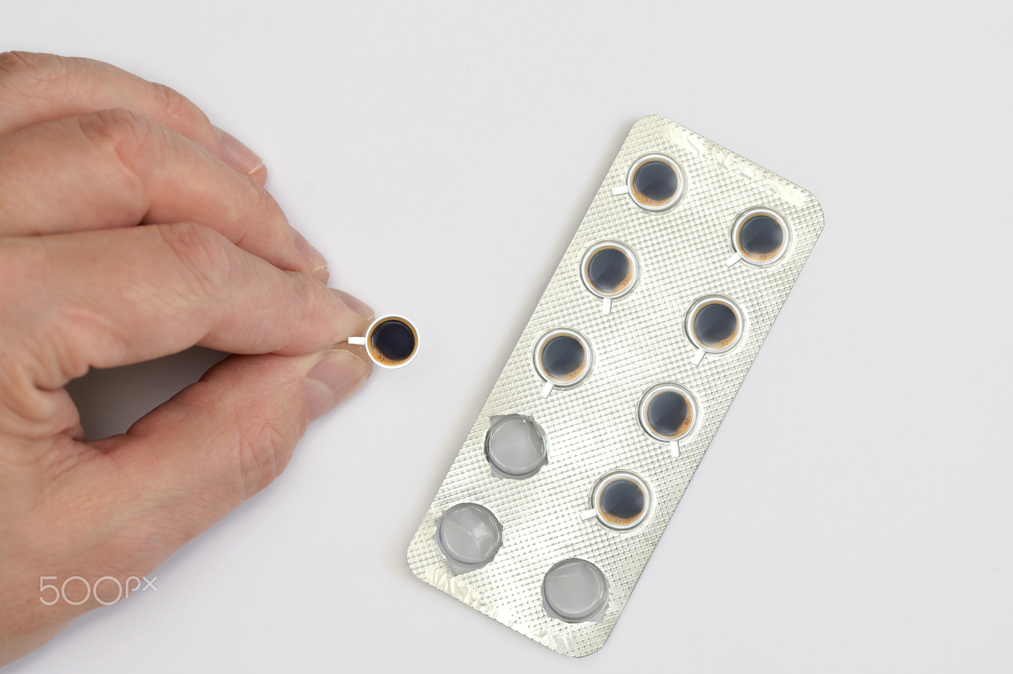 Blister Packaging Of Medicine Pills with Cups Of Coffee