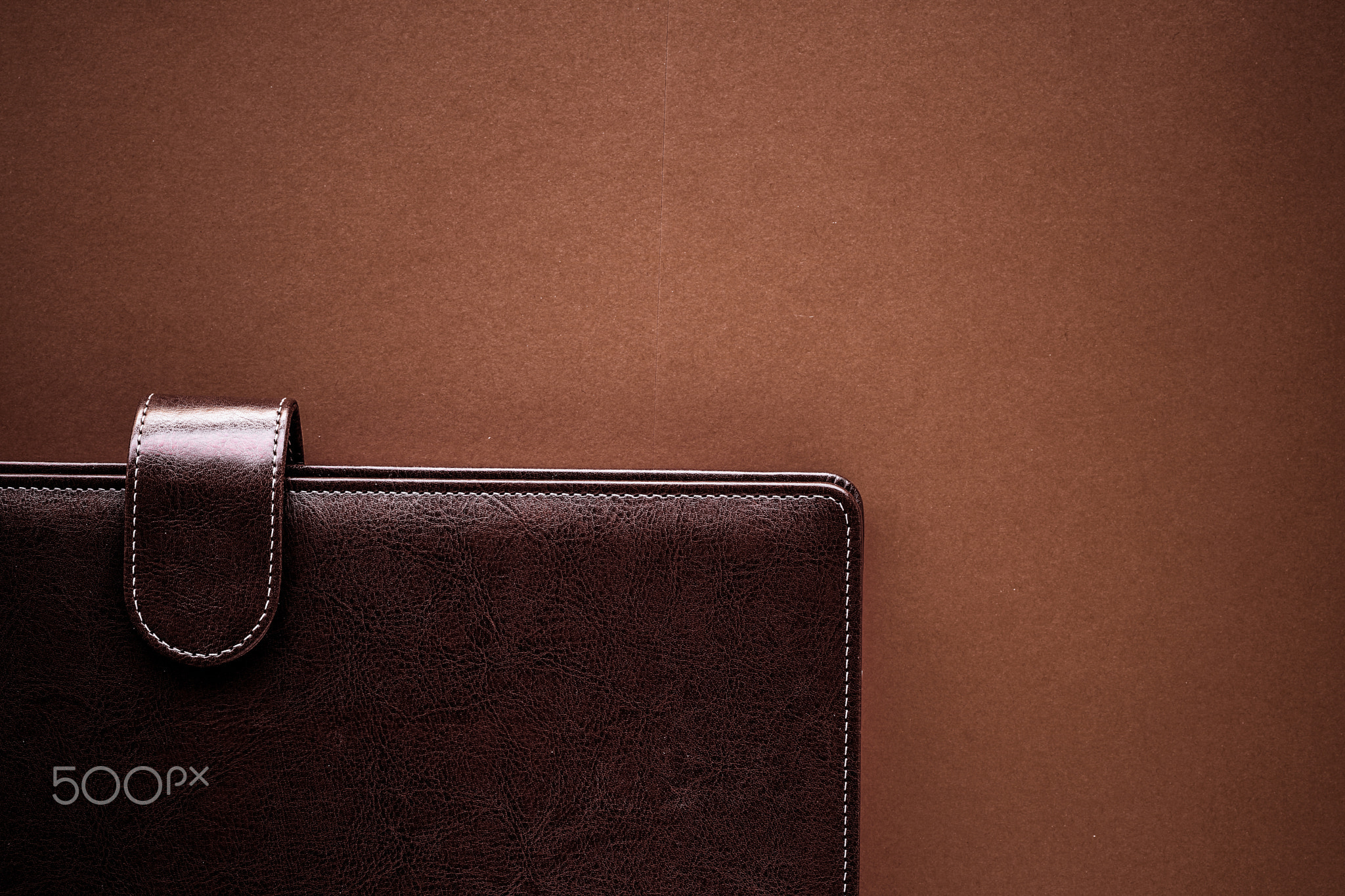 Vintage business briefcase on the office table desk, flatlay