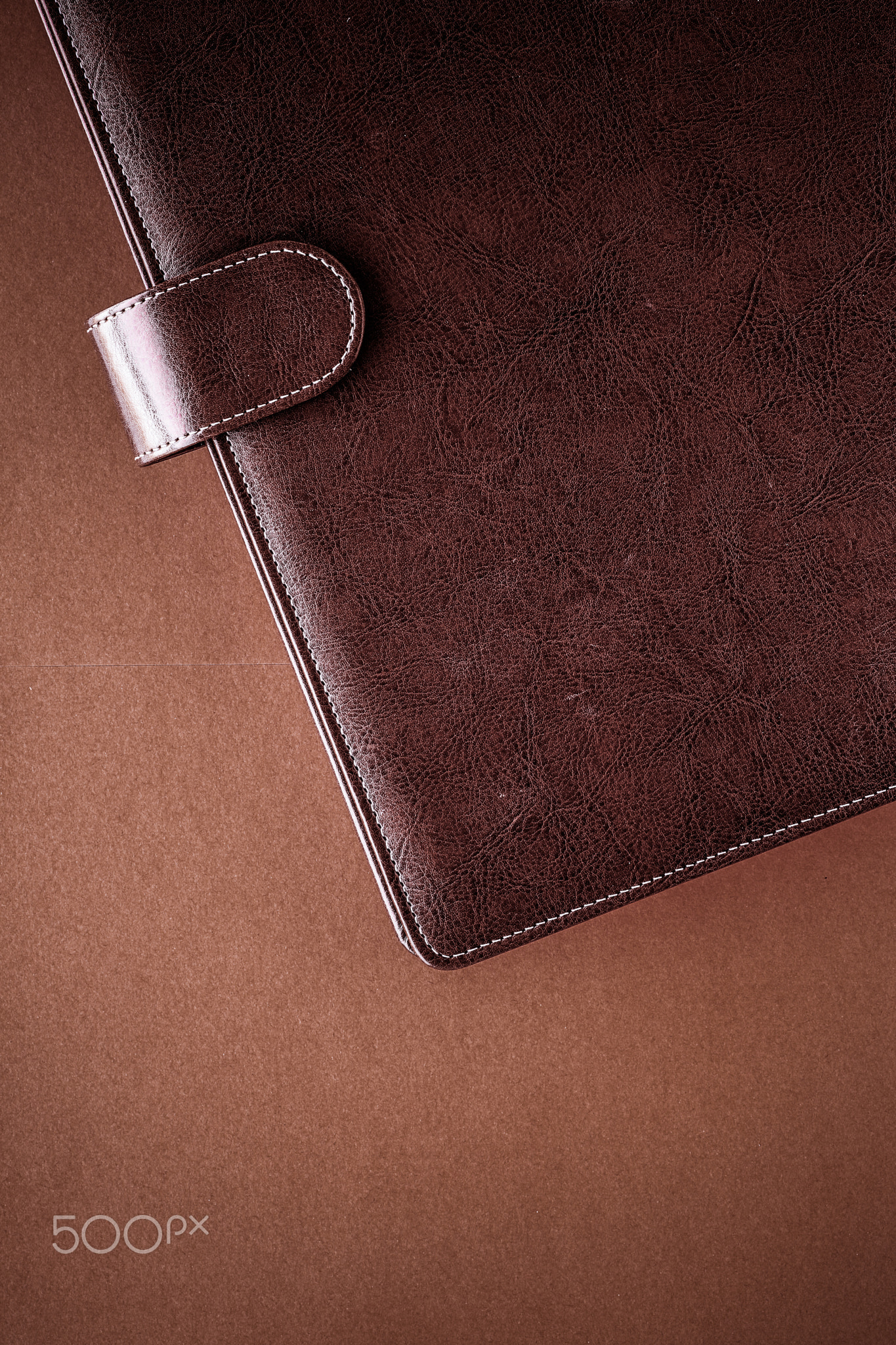 Vintage business briefcase on the office table desk, flatlay