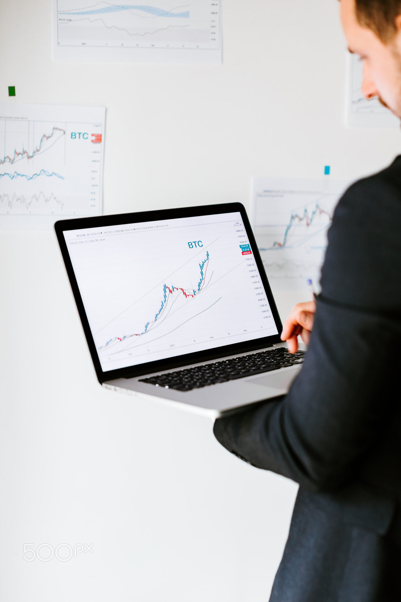 stock trader price trend graph analysing on smartphone