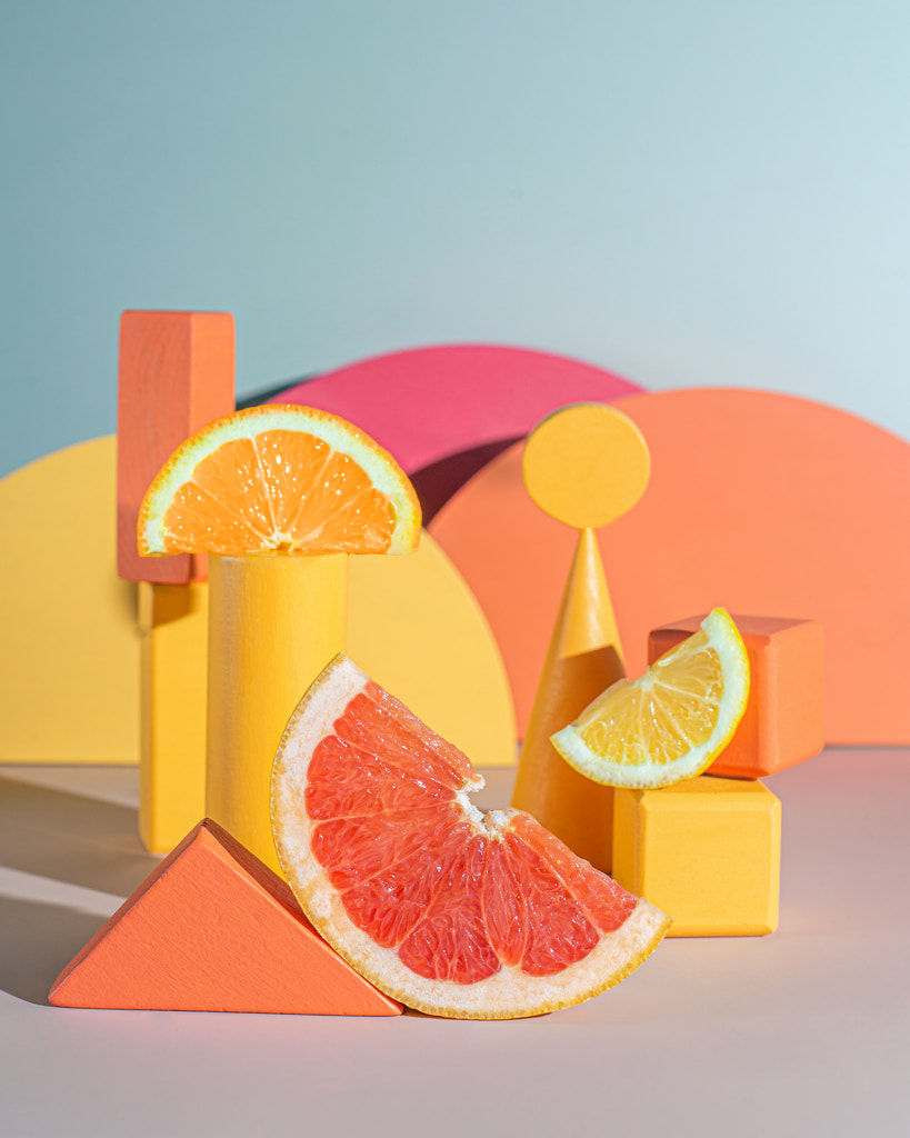 Vibrant still life with different citruses and geometric shapes. by Oleksandra Mykhailutsa on 500px.com