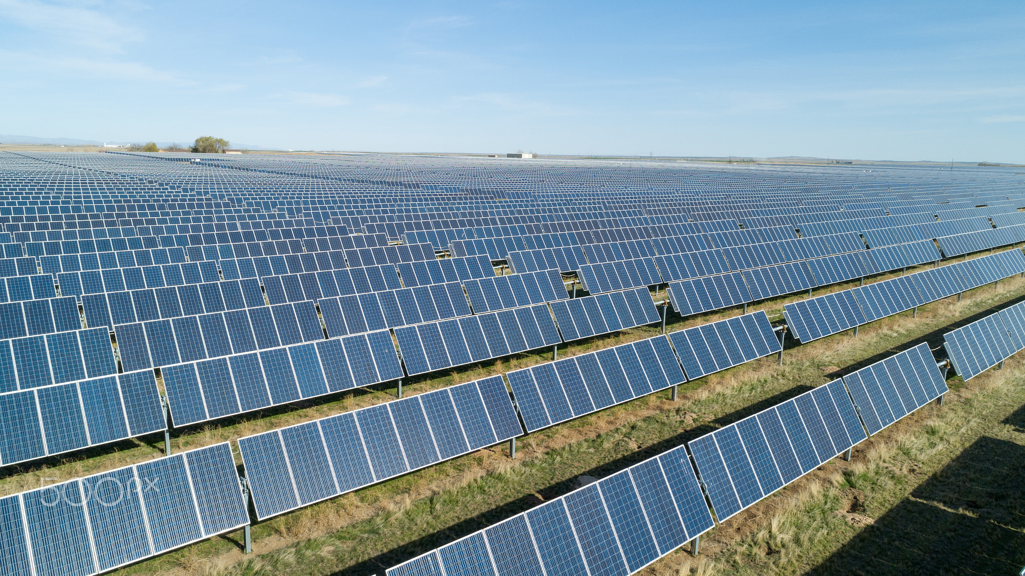 Solar panels making electricity for the power grid