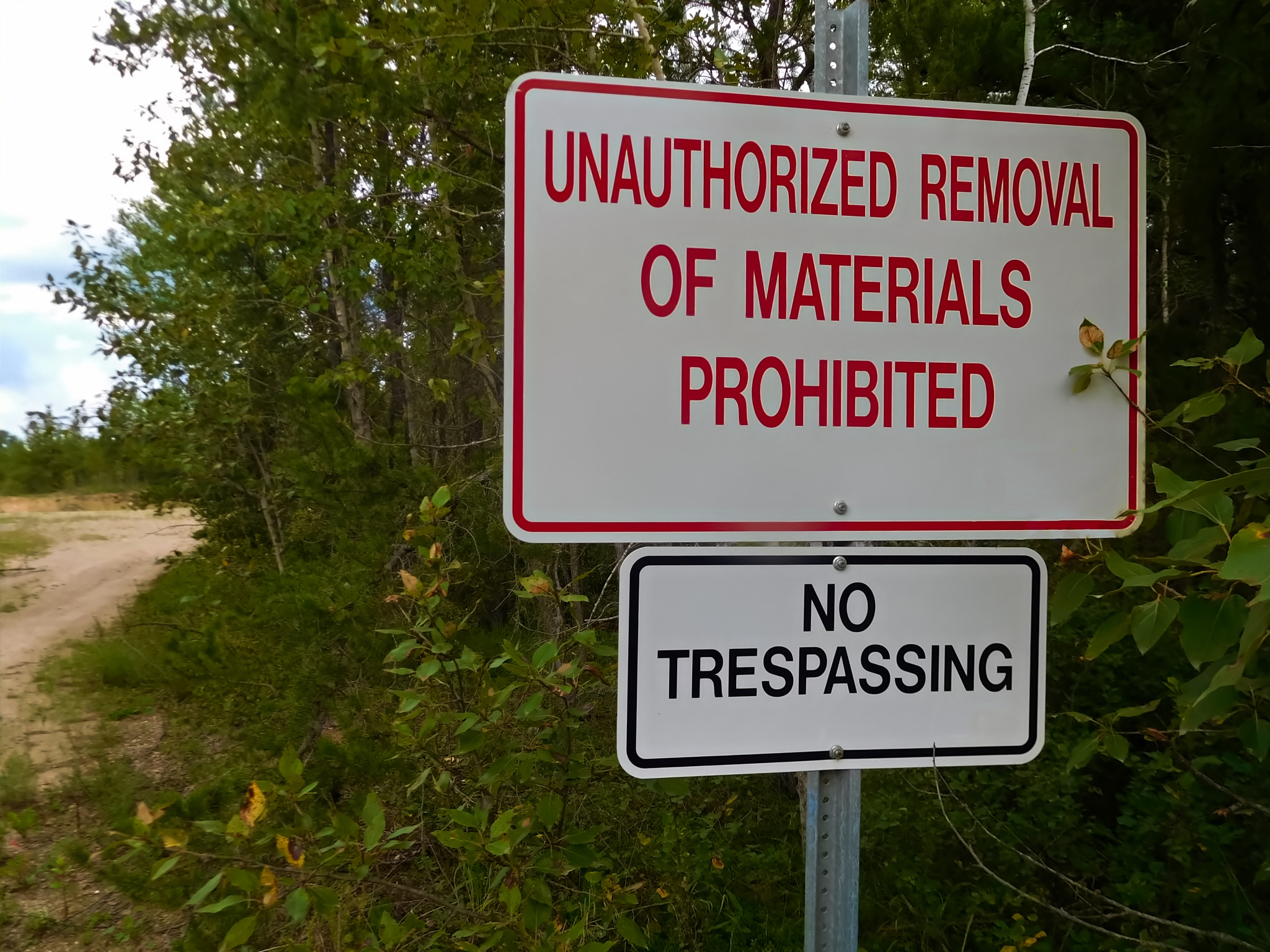 No UnAuthorized Removal of Materials Sign