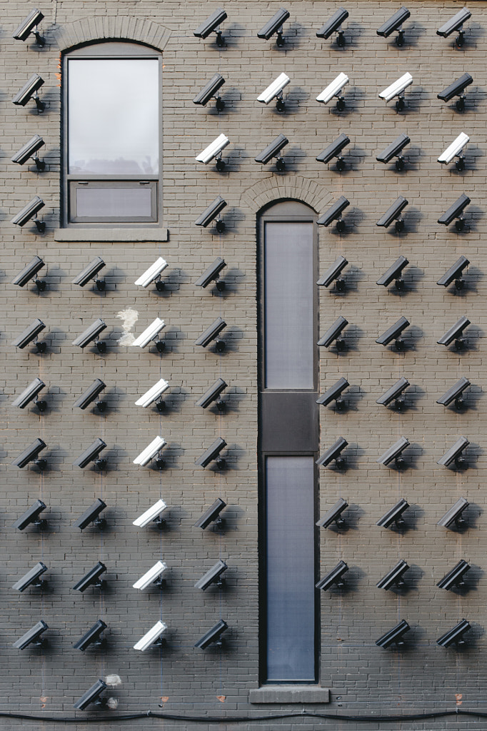 Security Cameras on Building Wall by Zak Nuttall on 500px.com
