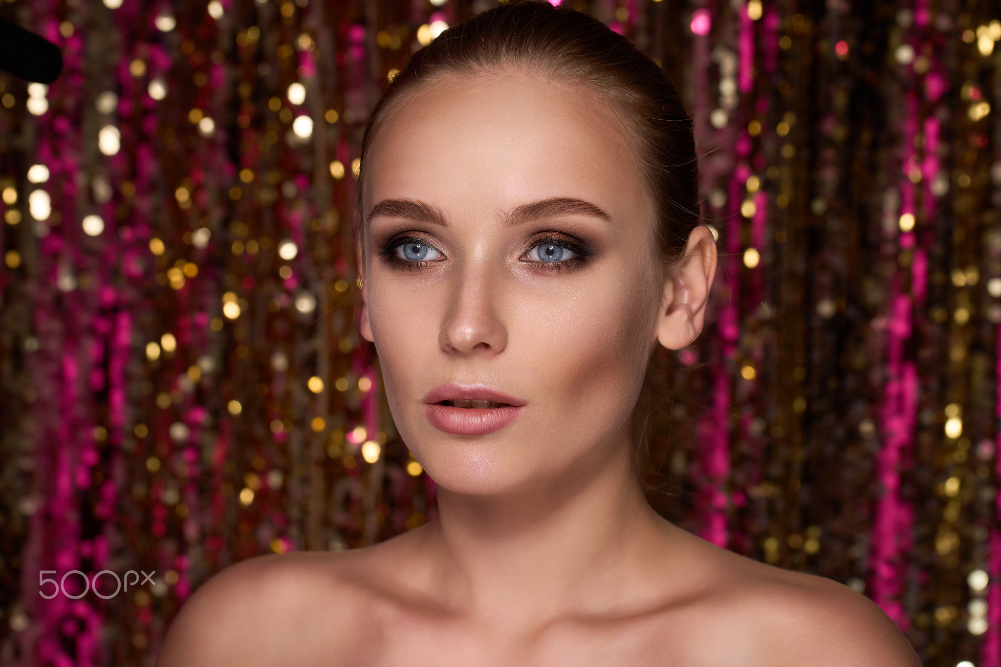 Beauty portrait of a High Fashion model woman in colorful bright neon