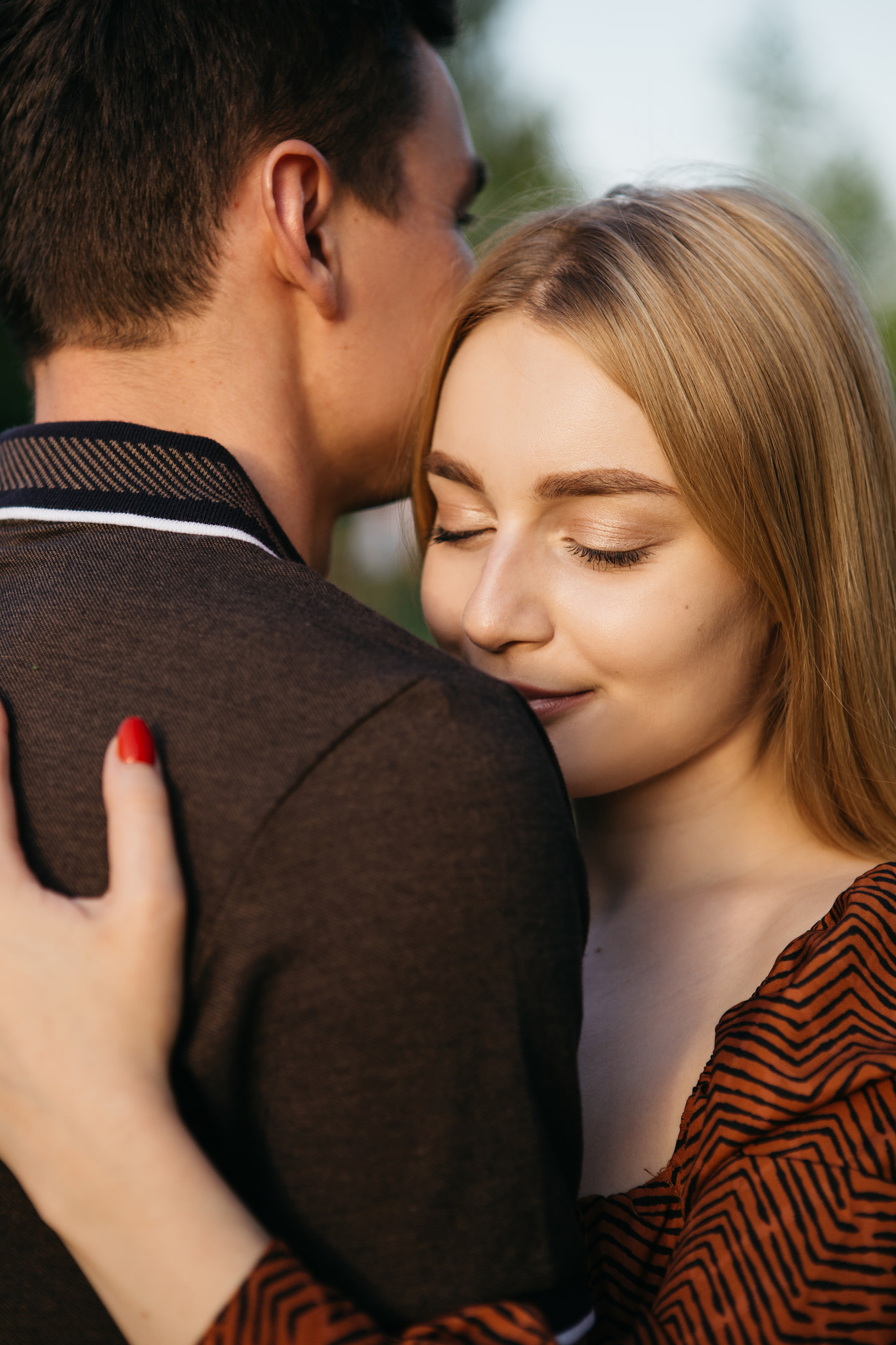 young couple hugging in the park Tver, Russia