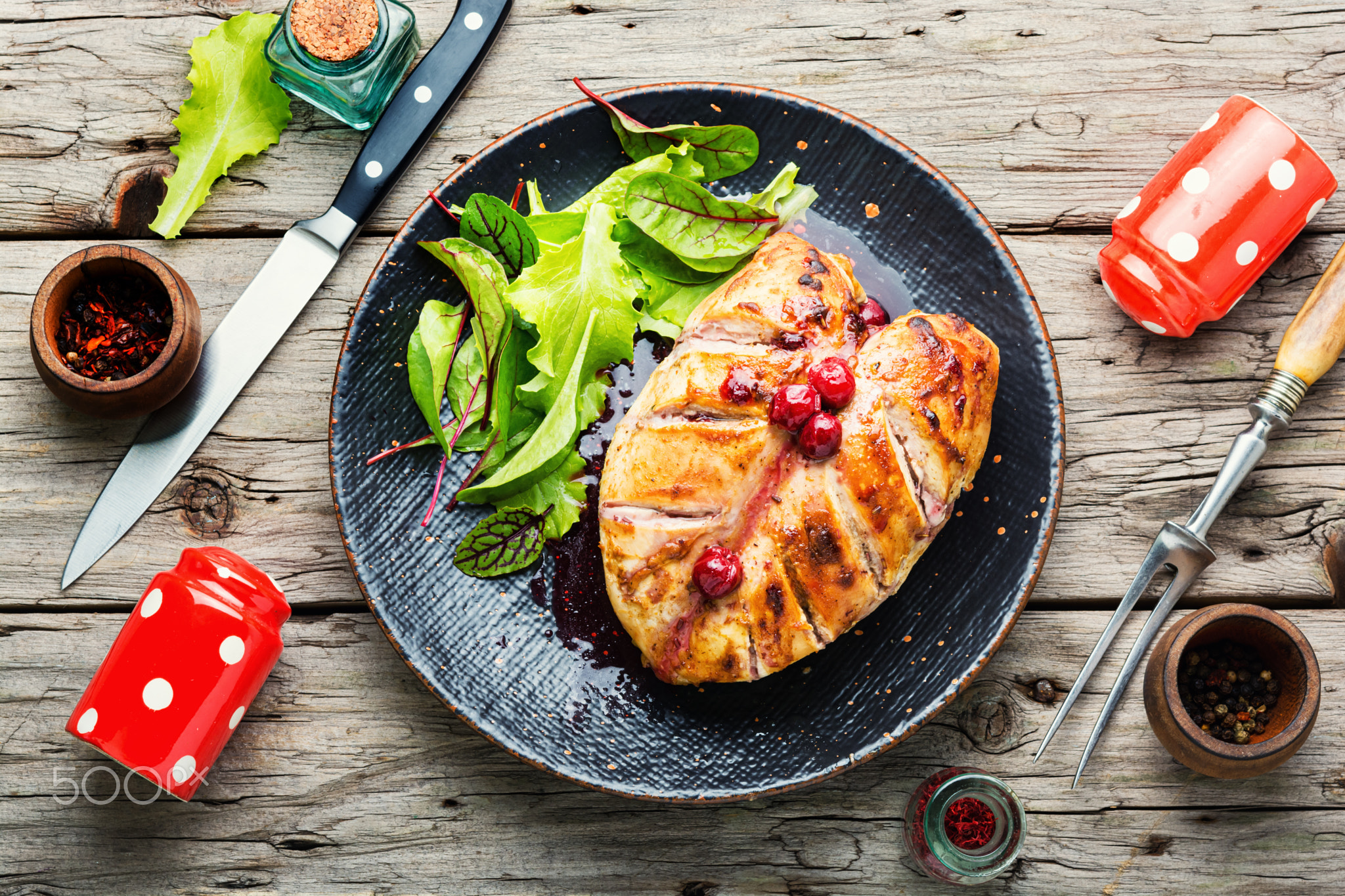 Grilled chicken fillet with cherry syrup,top view