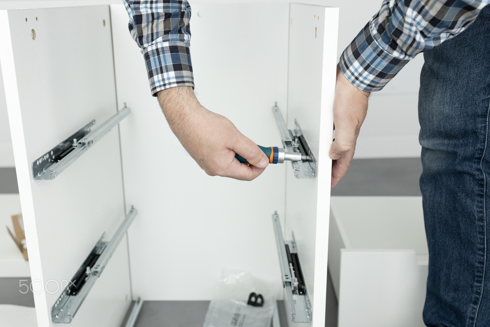 Man Assembling Furniture