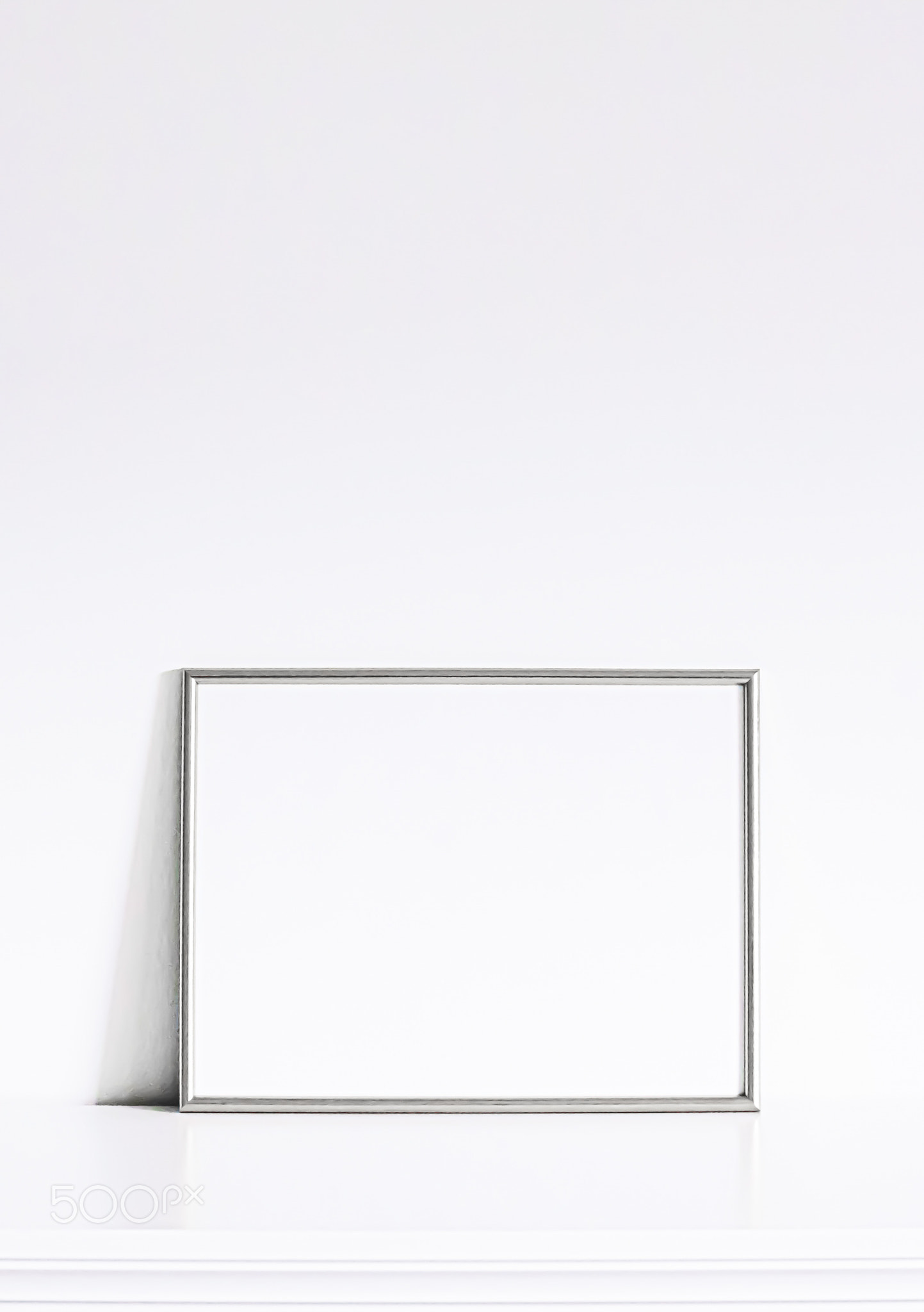 Silver frame on white furniture, luxury home decor and design for