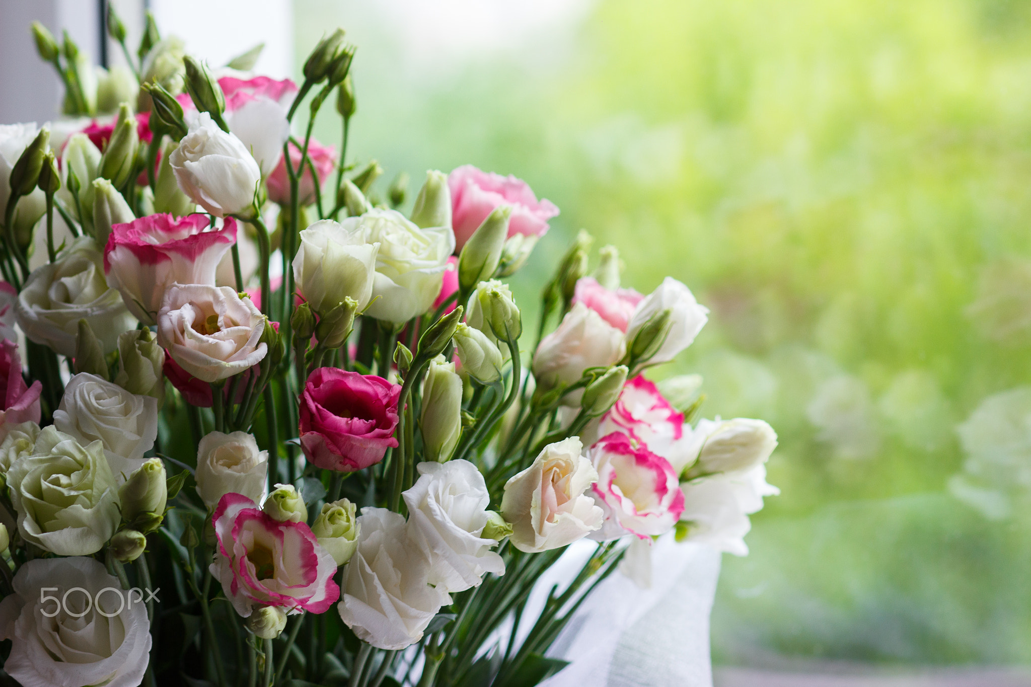 Bouquet from colored flowers of eustoma