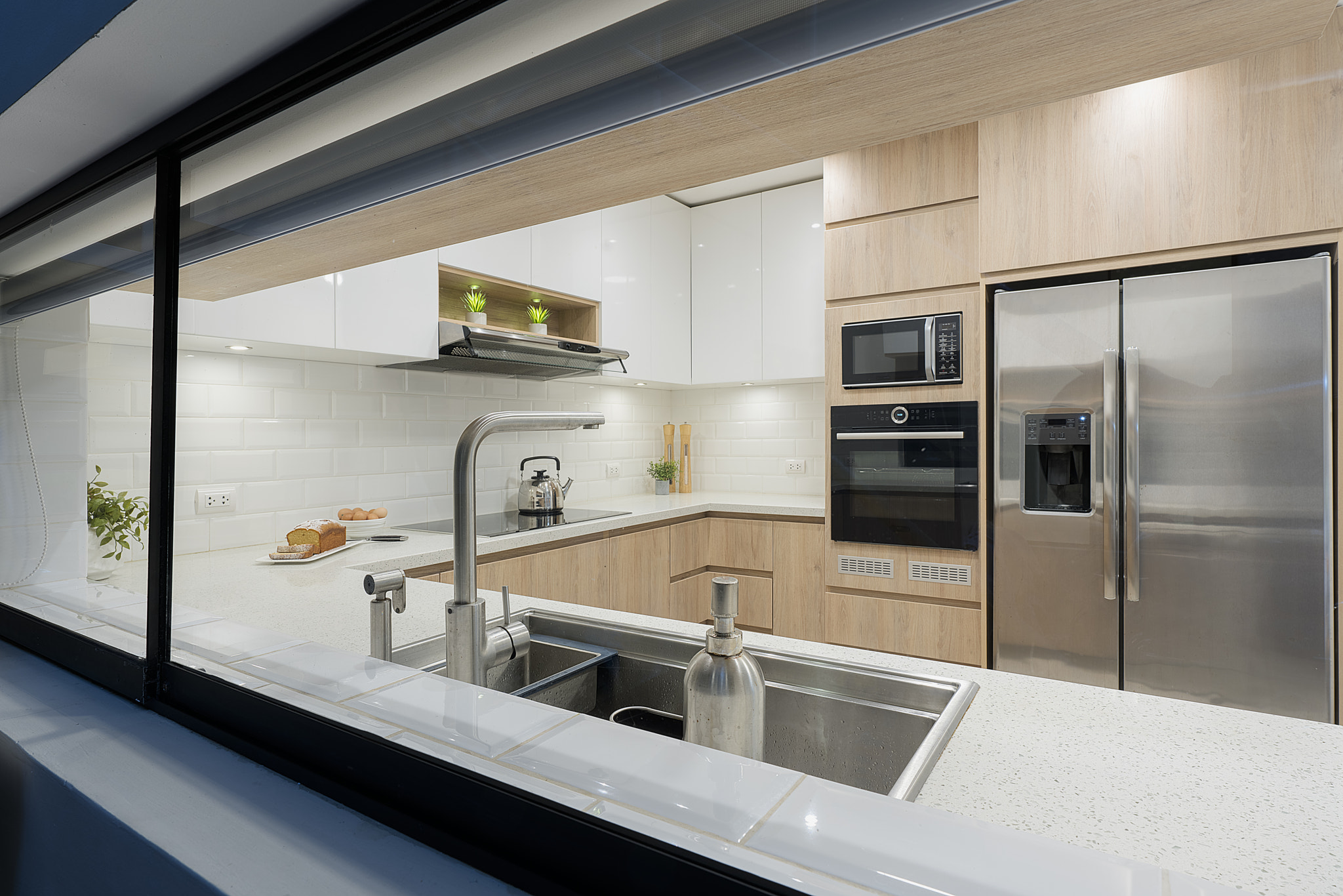 Kitchen with good lighting from the other side of the window.