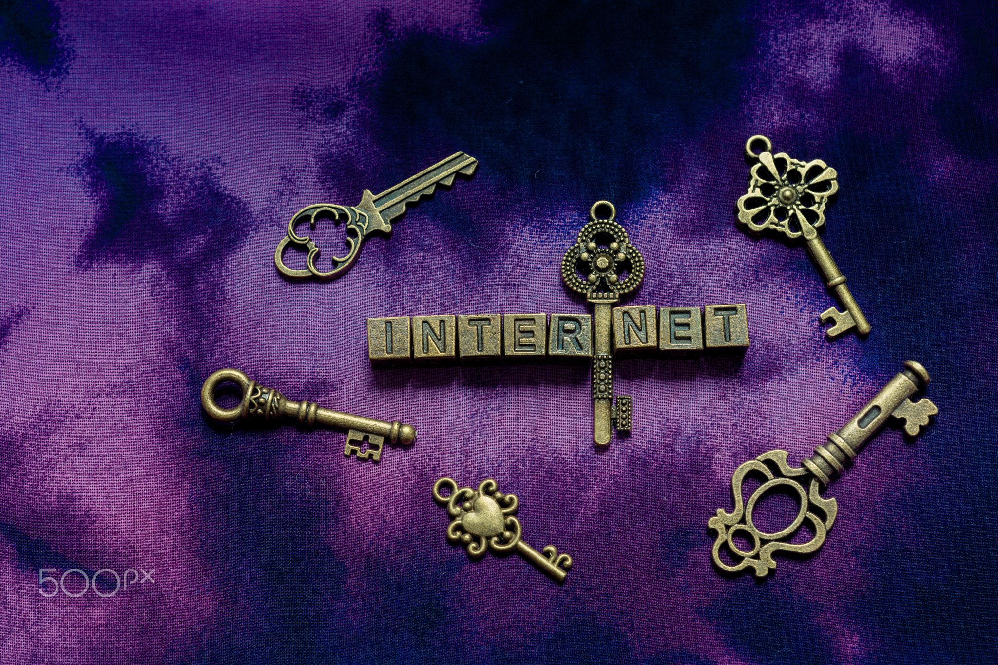 internet wording with metal letters and keys as business concept