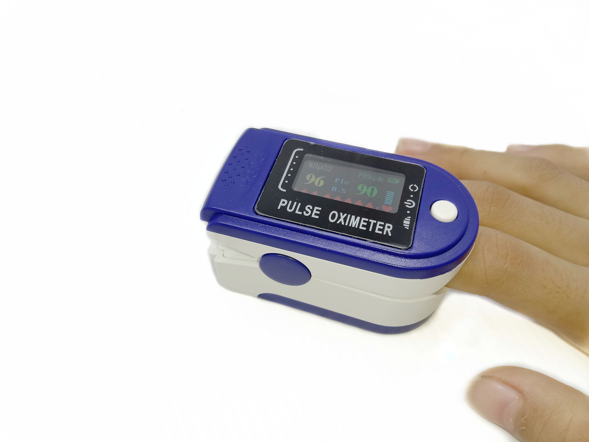 Man using pulse oximeter on his fingertip