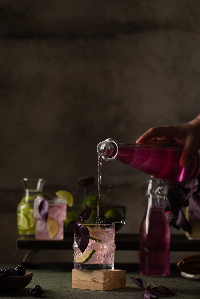 Refreshing lemonade with blackberry puree,purple basil,lime and ice on by Olga on 500px.com