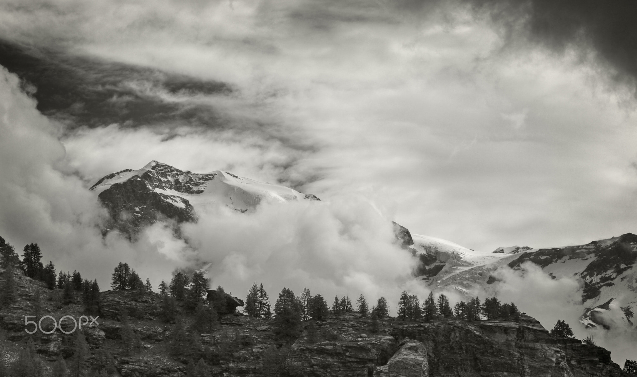 Mount Castor emerging from the clouds