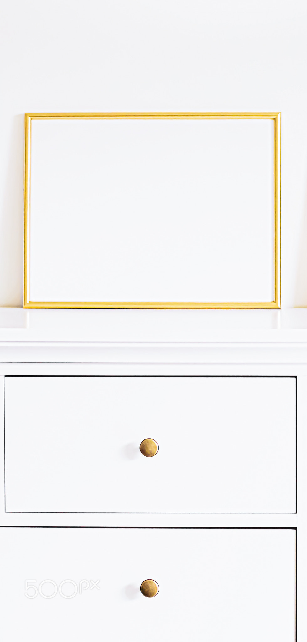Golden frame on white furniture, luxury home decor and design for