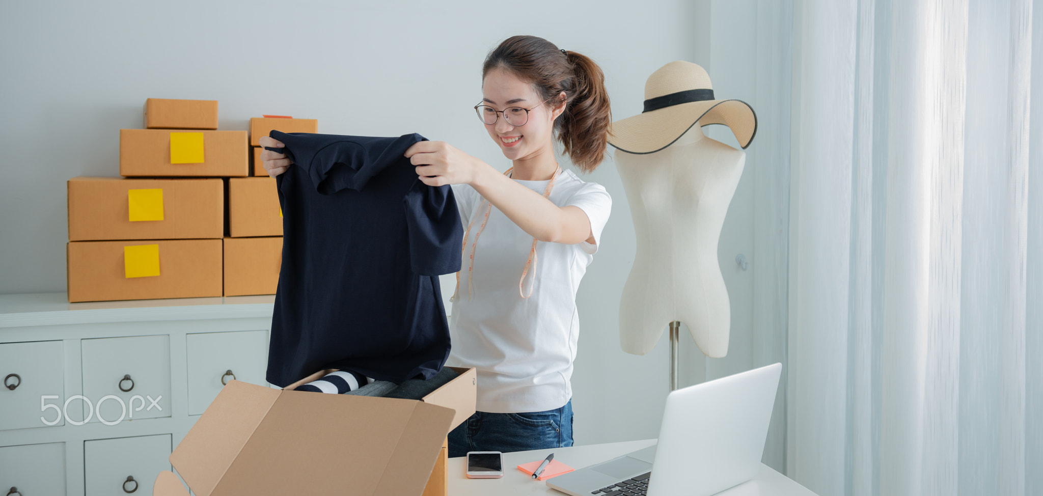 Young asian girl is freelancer with her private business