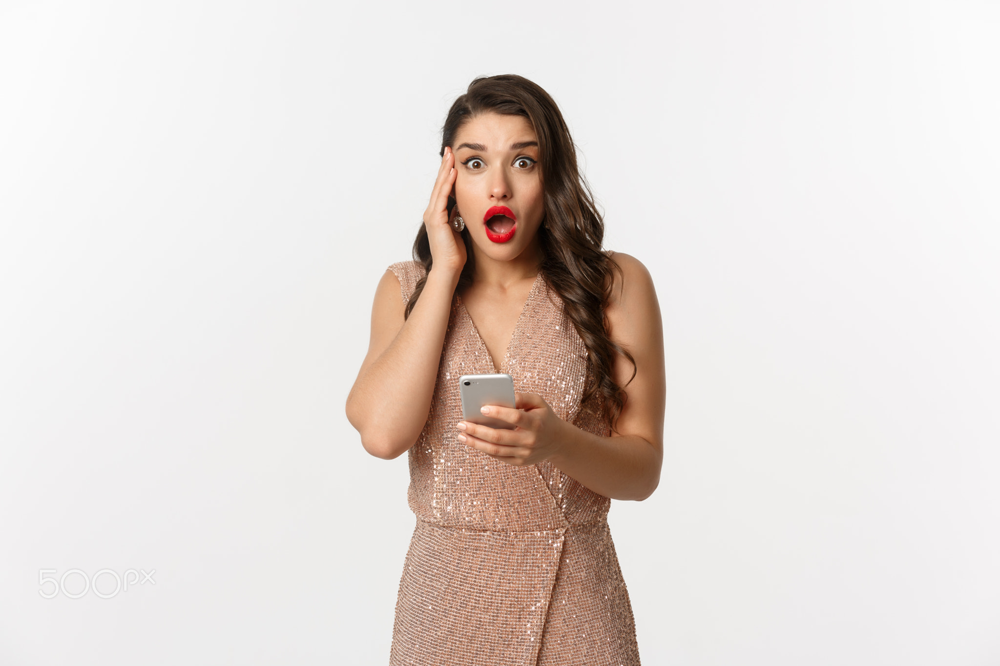 Holidays, online shopping concept. Surprised woman using mobile phone