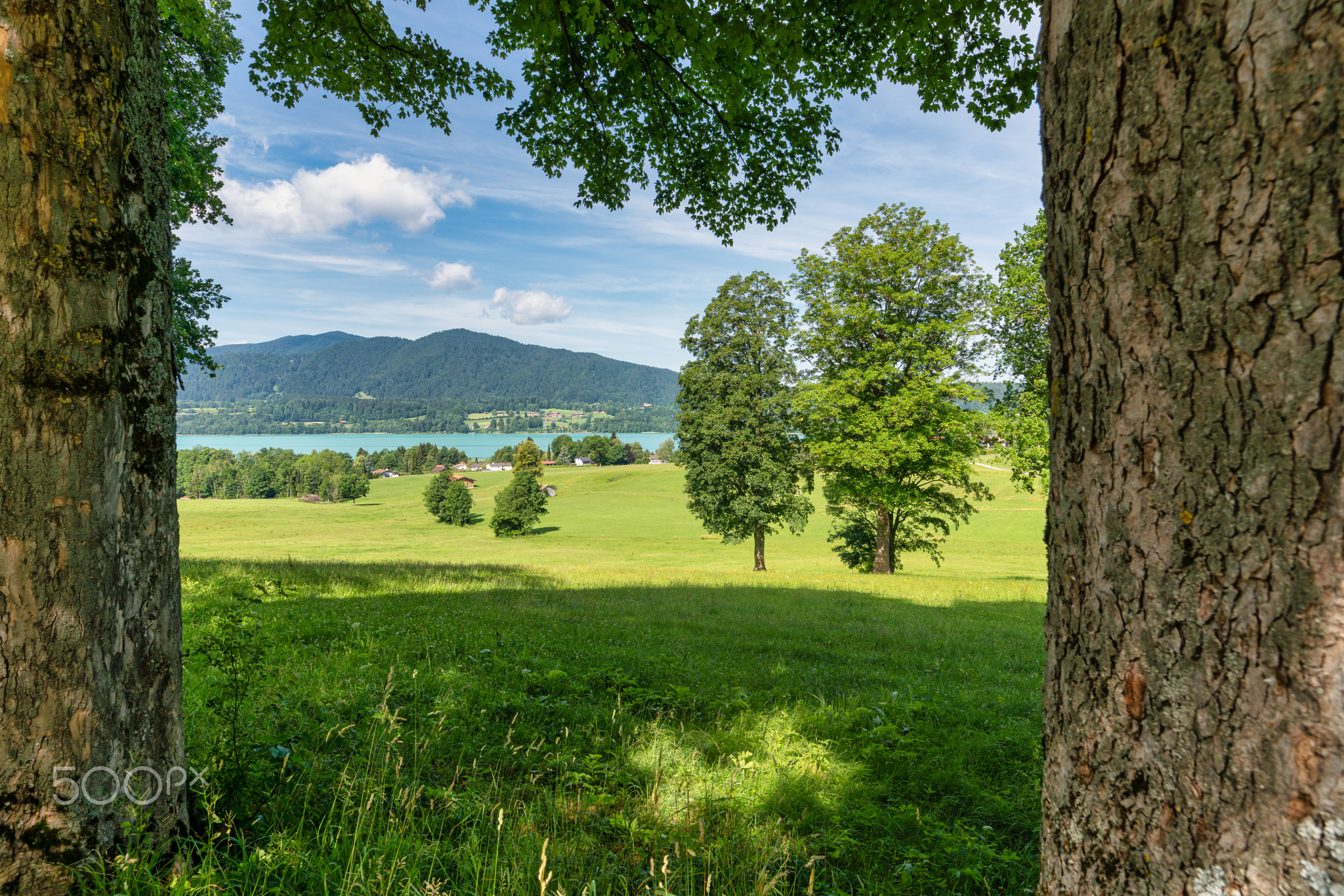 Framed view at the wonderful turquoise colored Tegernsee, a famous