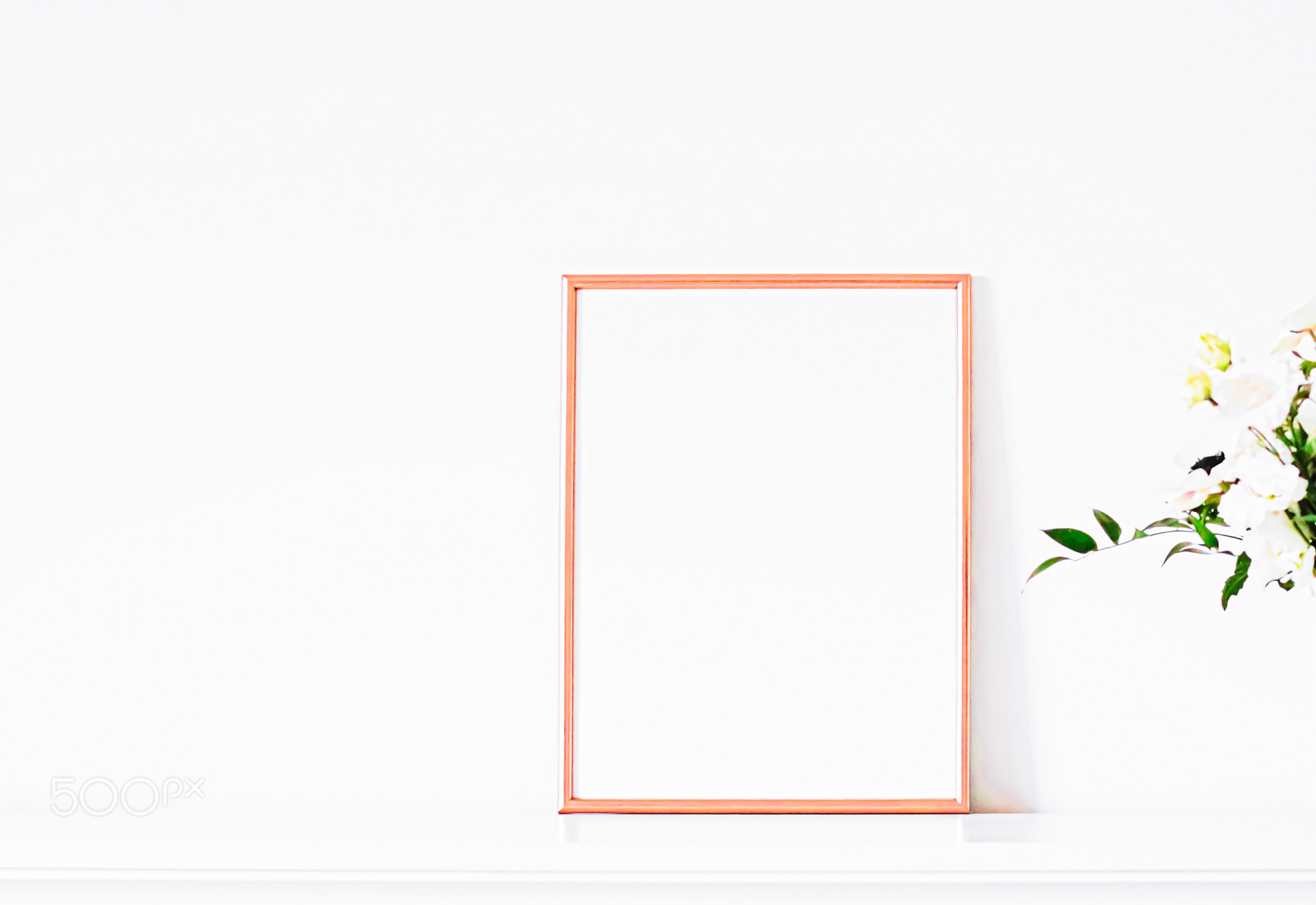Rose gold frame on white furniture, luxury home decor and design for