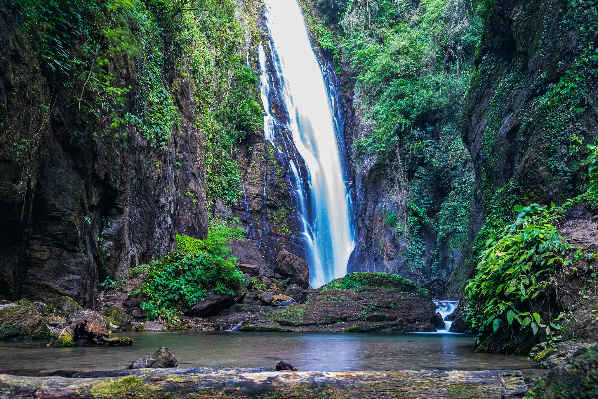 Sitting on the edge of the waterfall