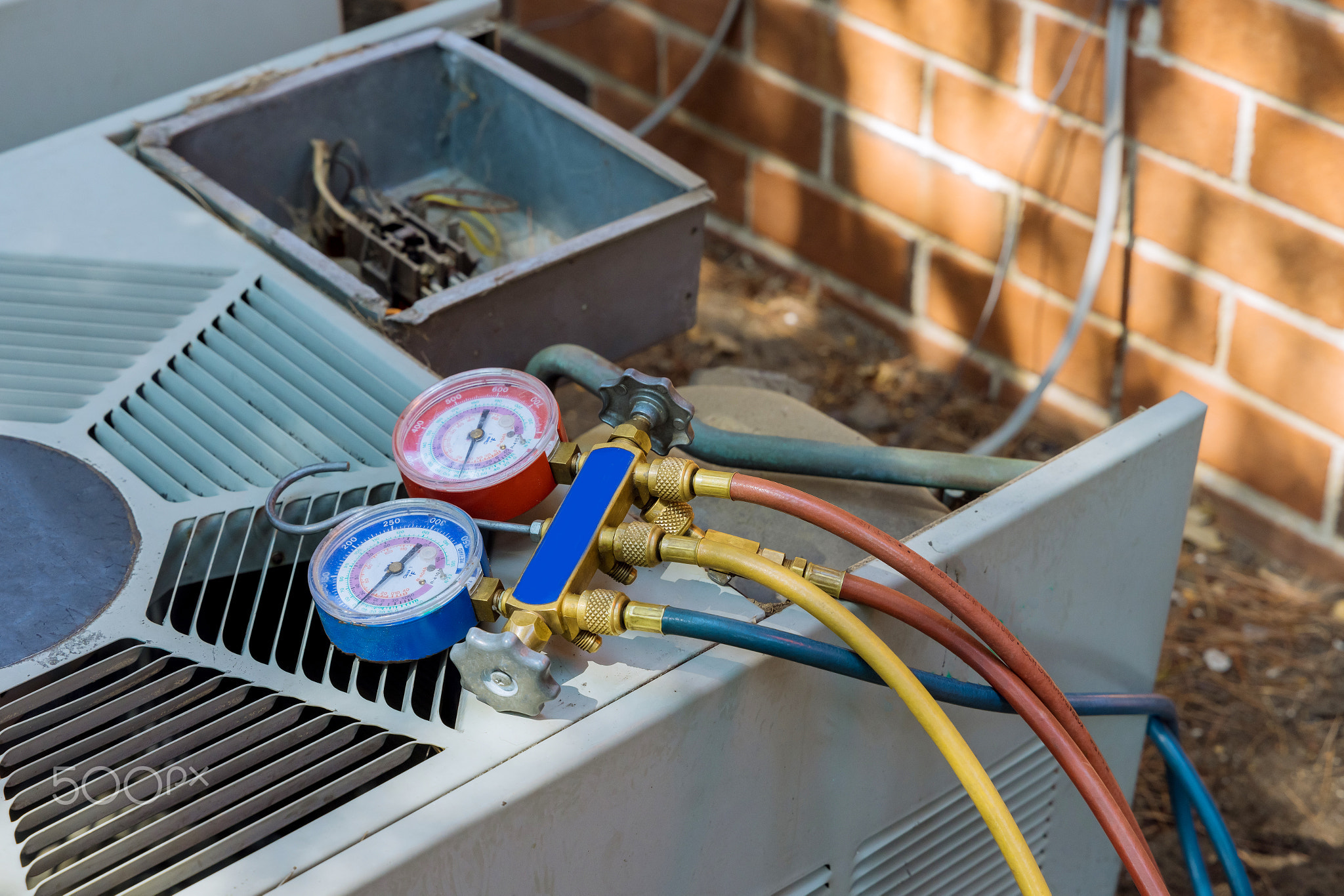 Air conditioning for technician is checking air conditioner measuring