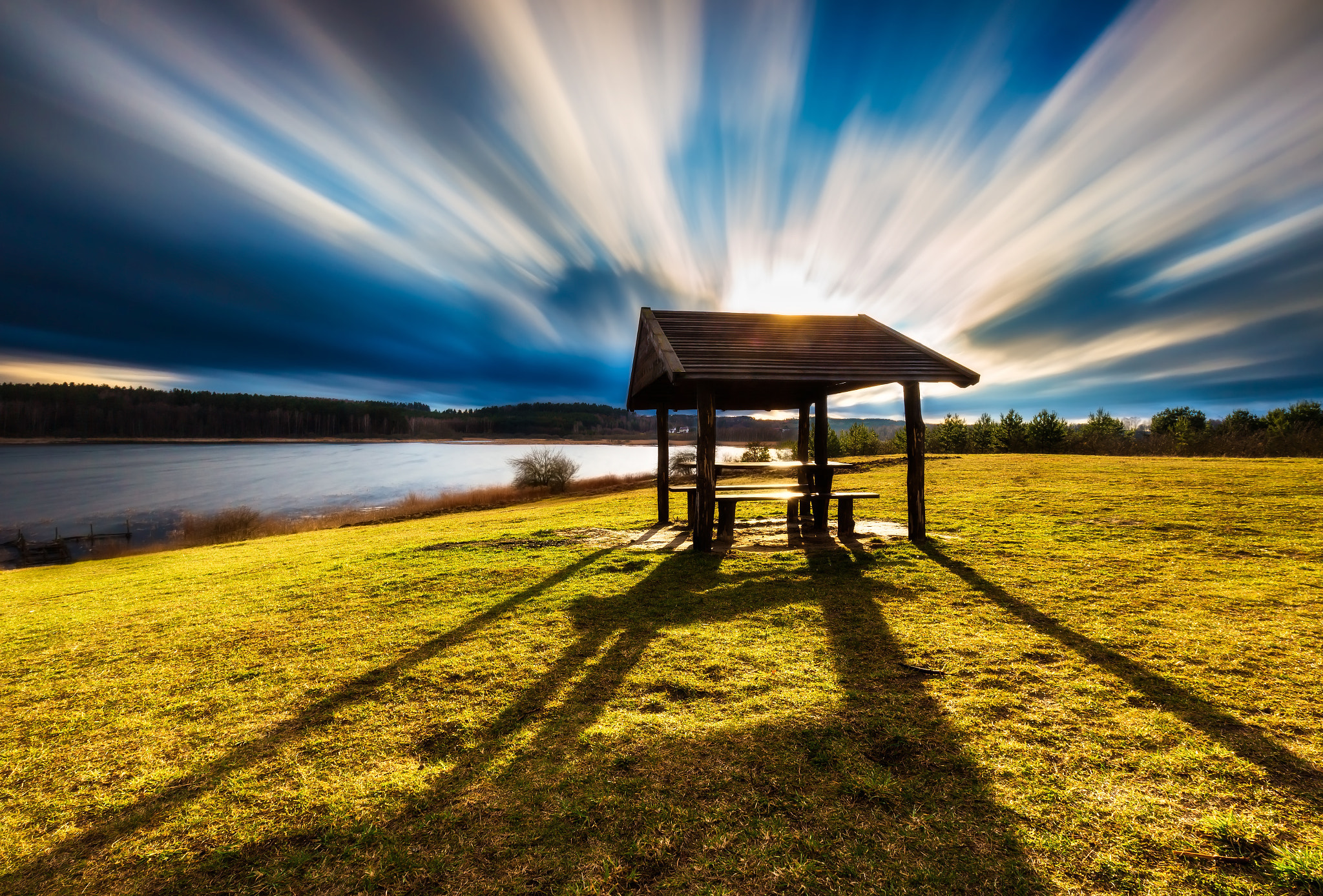 Landscape with wooden hut. Long exposure photo.