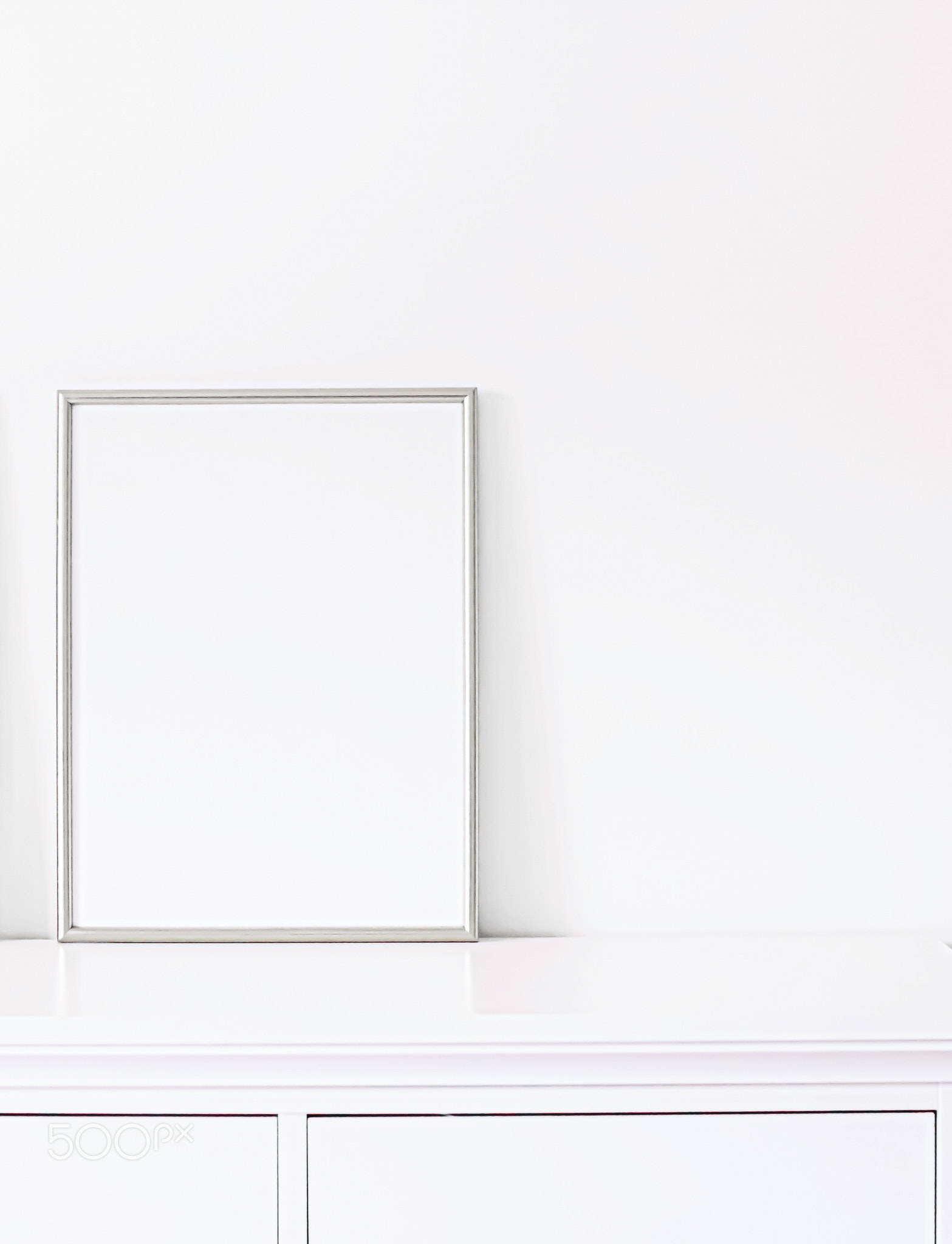 Silver frame on white furniture, luxury home decor and design for