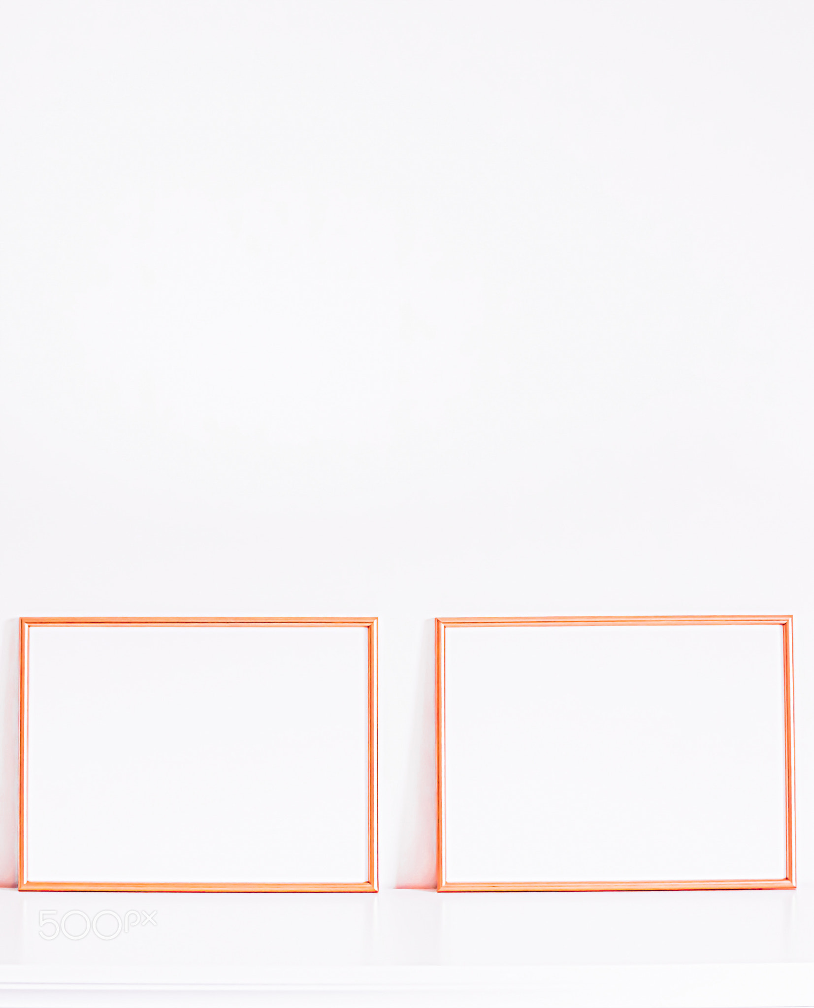 Rose gold frame on white furniture, luxury home decor and design for