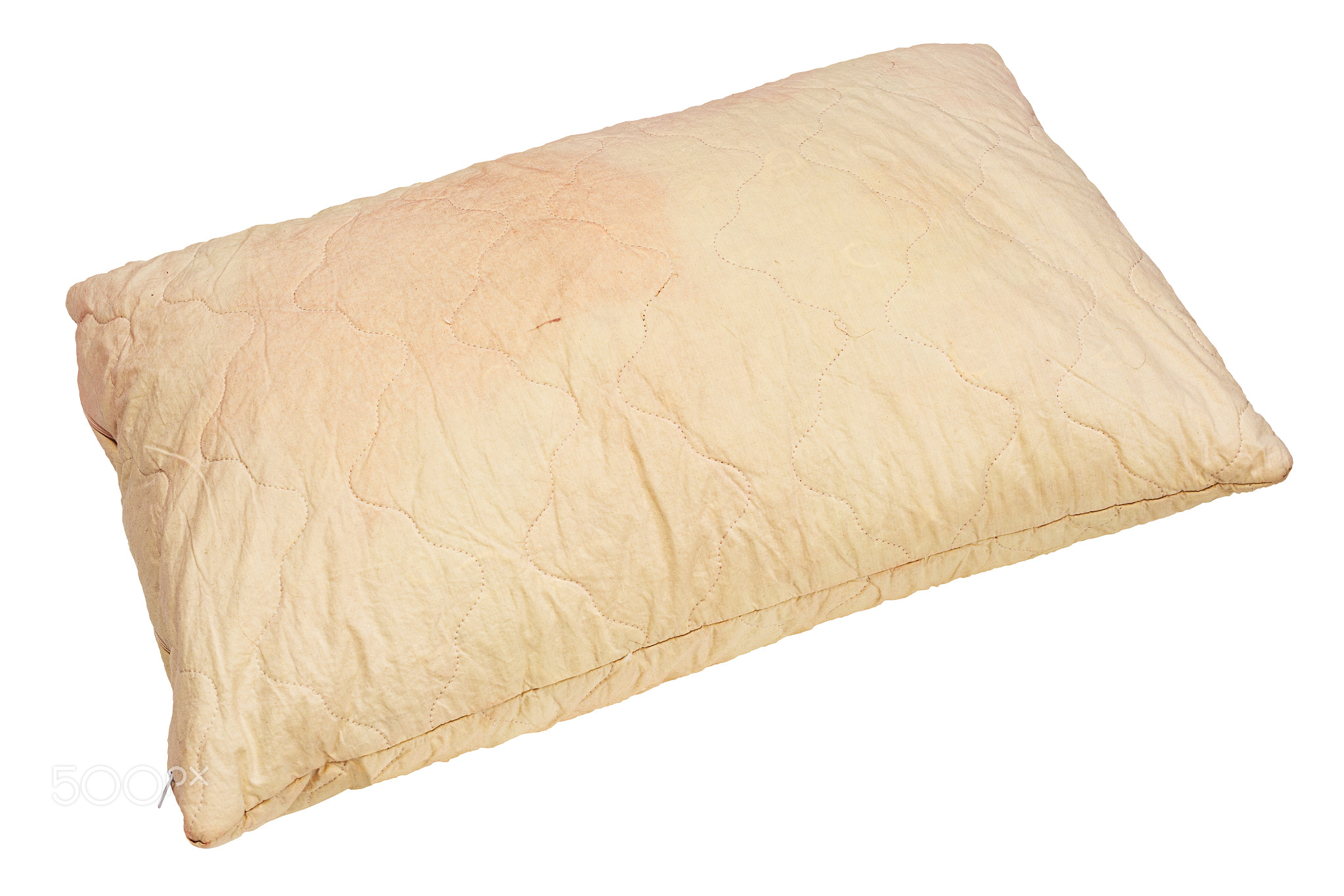 dirty used spotted pillow isolated on white background in diagonal