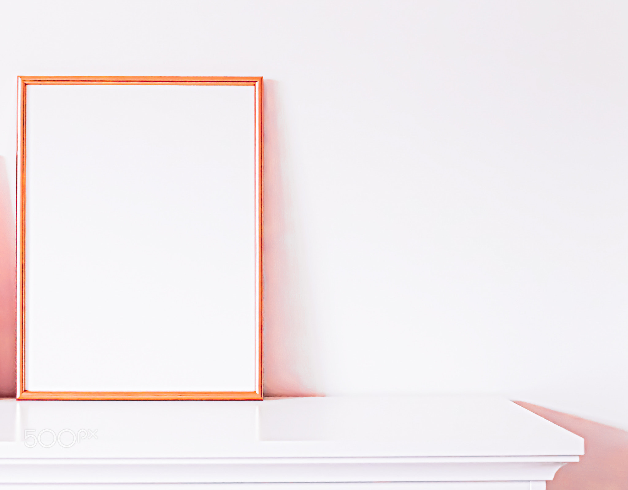 Rose gold frame on white furniture, luxury home decor and design for