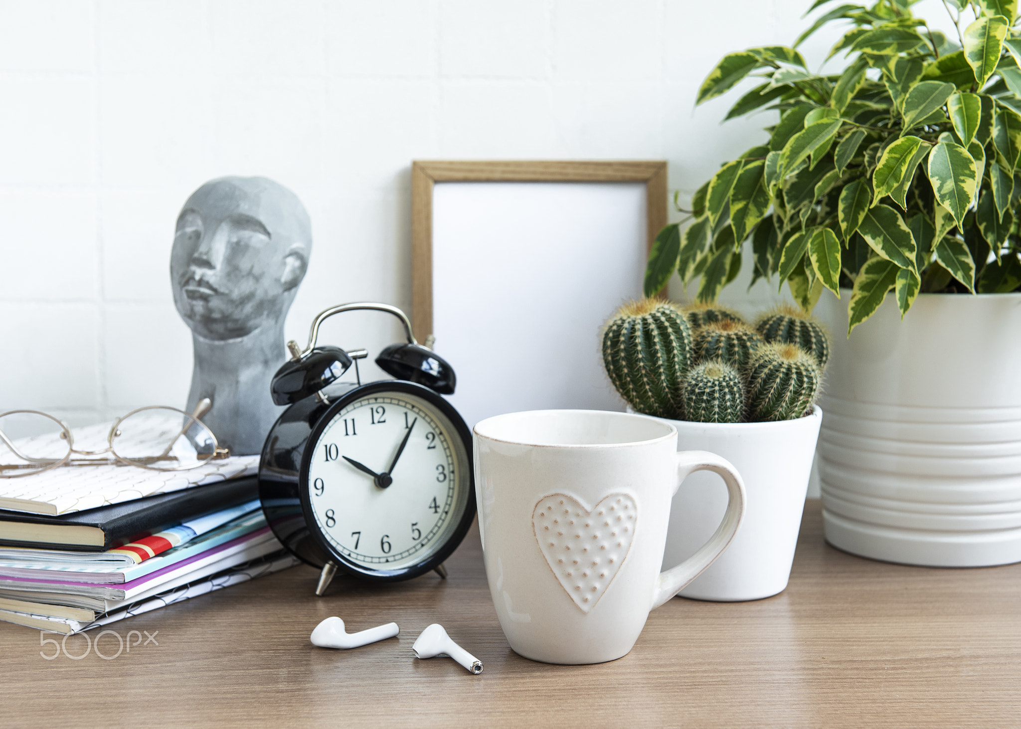 Office desk with stack of notepads