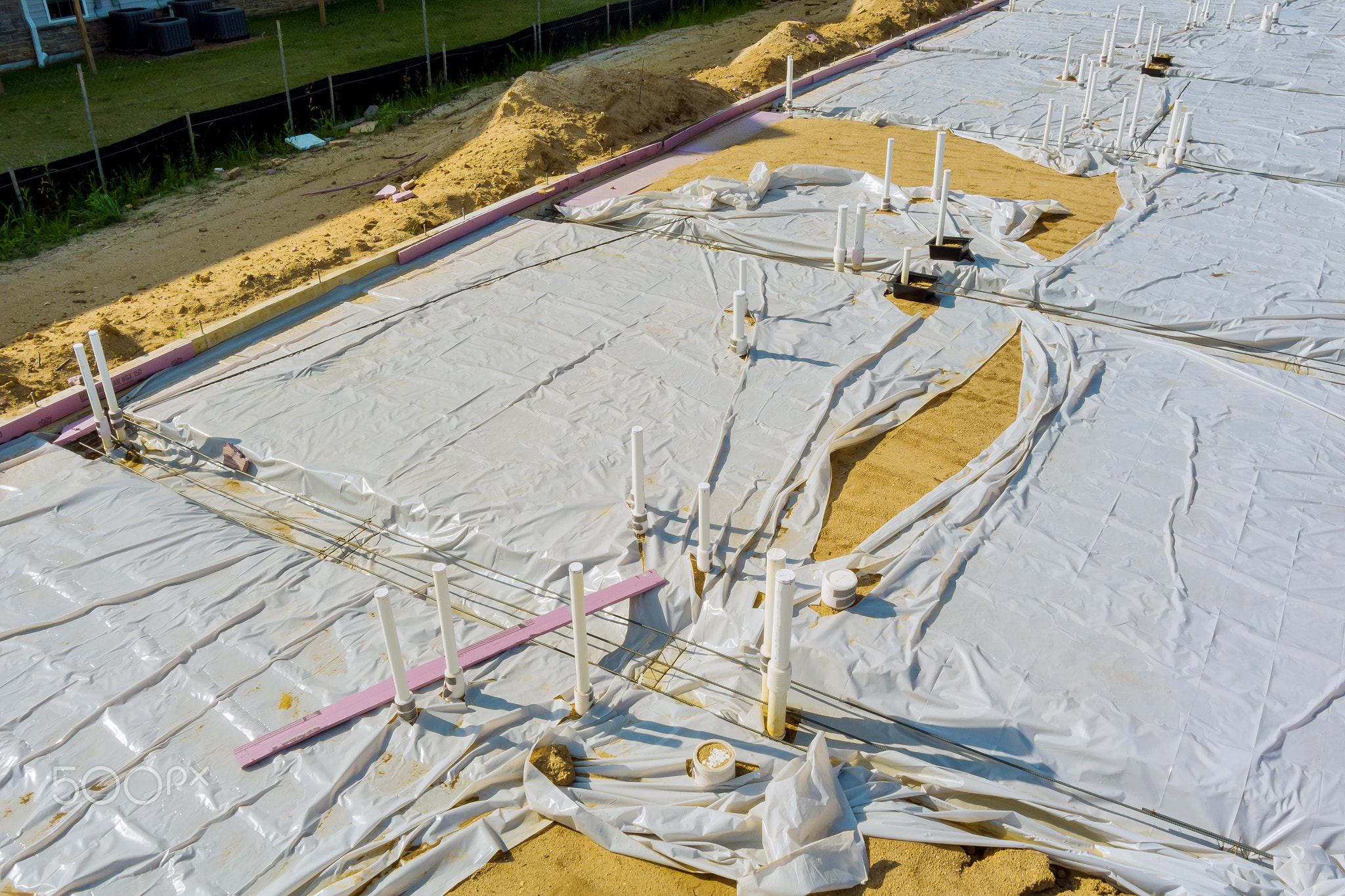 Laying installation of a new PVC plastic pipe of the earth for pipe